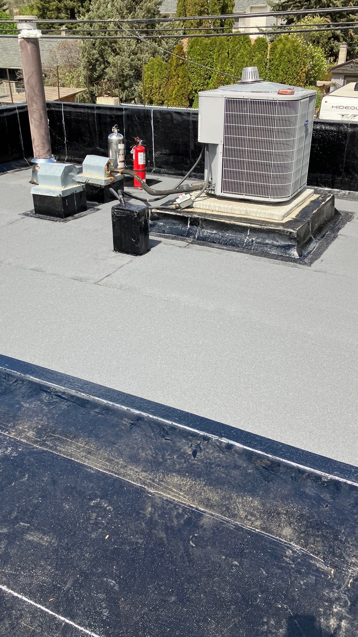 Commercial ReRoofing Installation using IKO 2ply sbs by Top Notch Roofing Inc