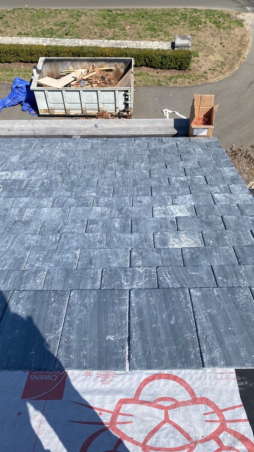 Residential Roofing Installation using Vermont Slate by A Plus Exterior