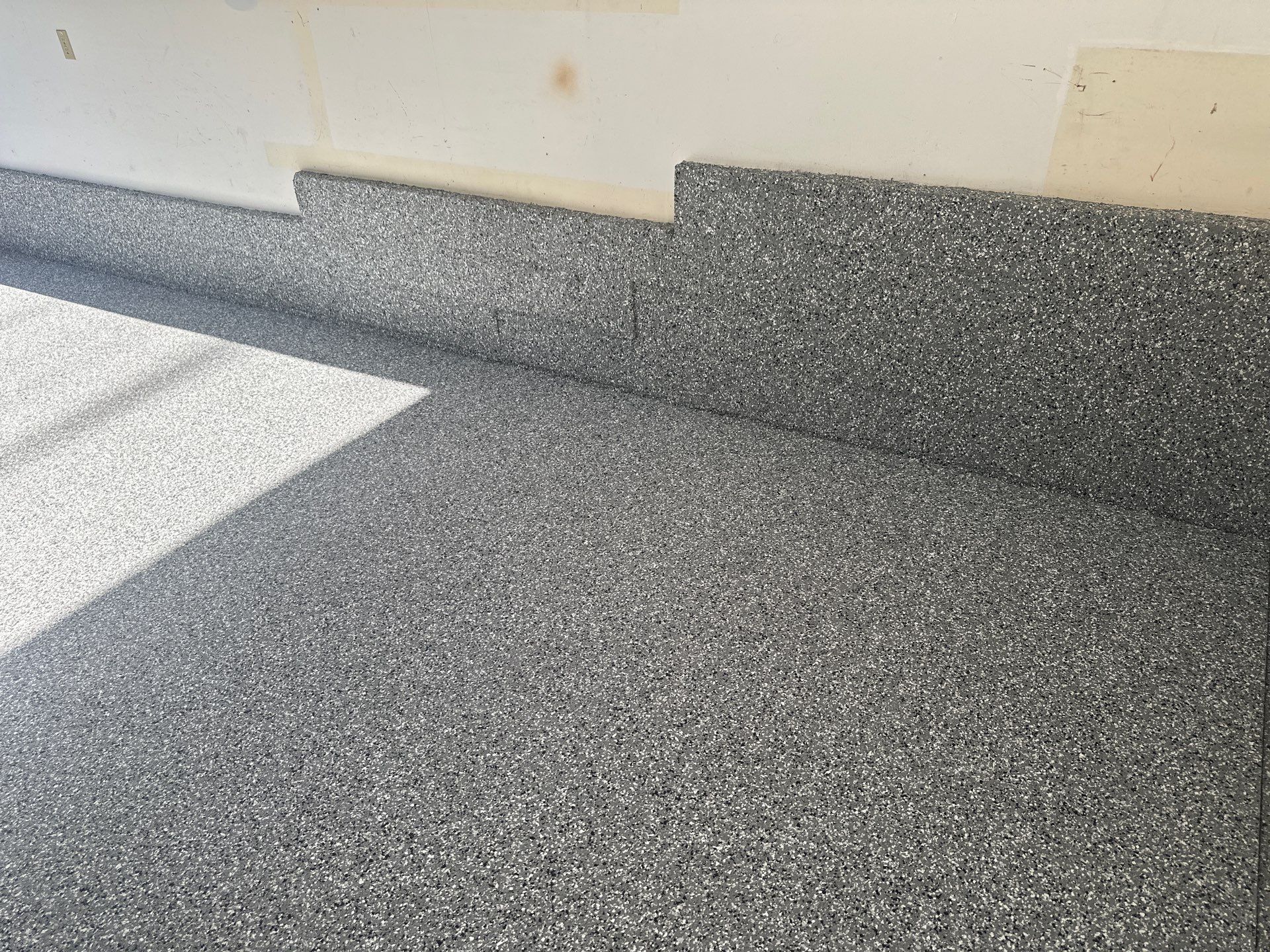 Polyurea Garage Floor Coating with Simiron Wombat Chip Finish by MGP Coatings