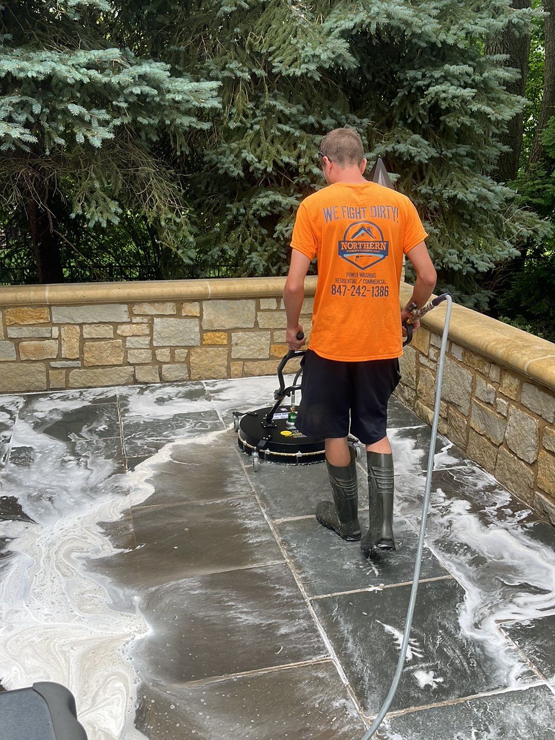 Northbrook, IL stucco home soft wash and stone cleaning by Northern Power Washing LLC.