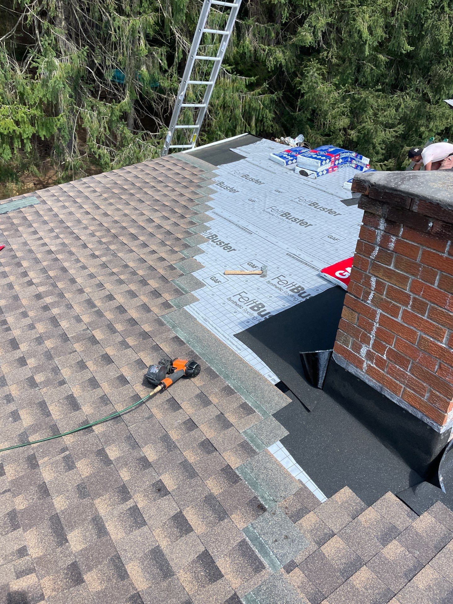 Residential Roofing Installation using GAF TImberline HDZ Hickory by Rainstoppers Roofing
