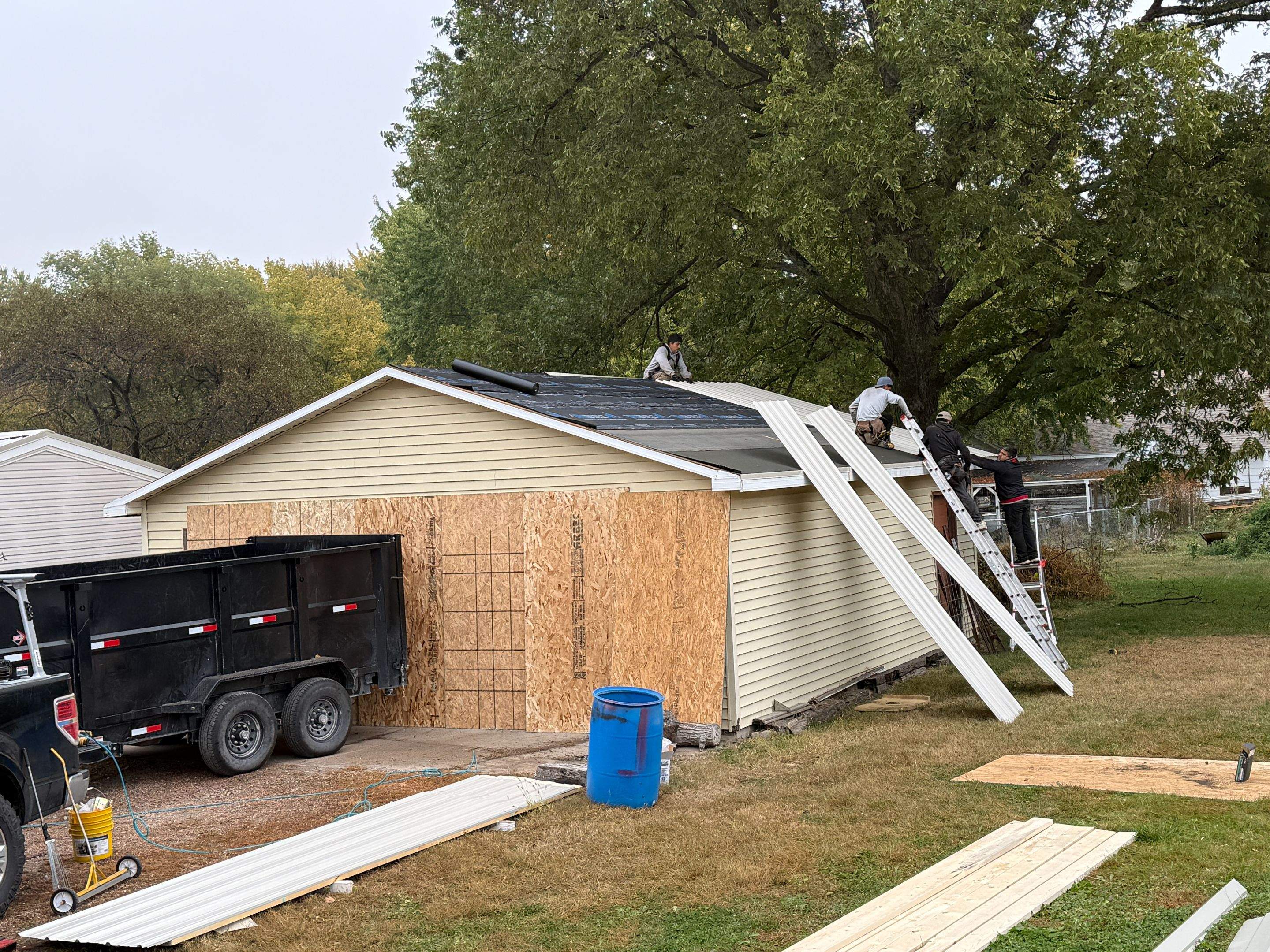 Central City Residential Garage Metal Roof Installation by Star Home