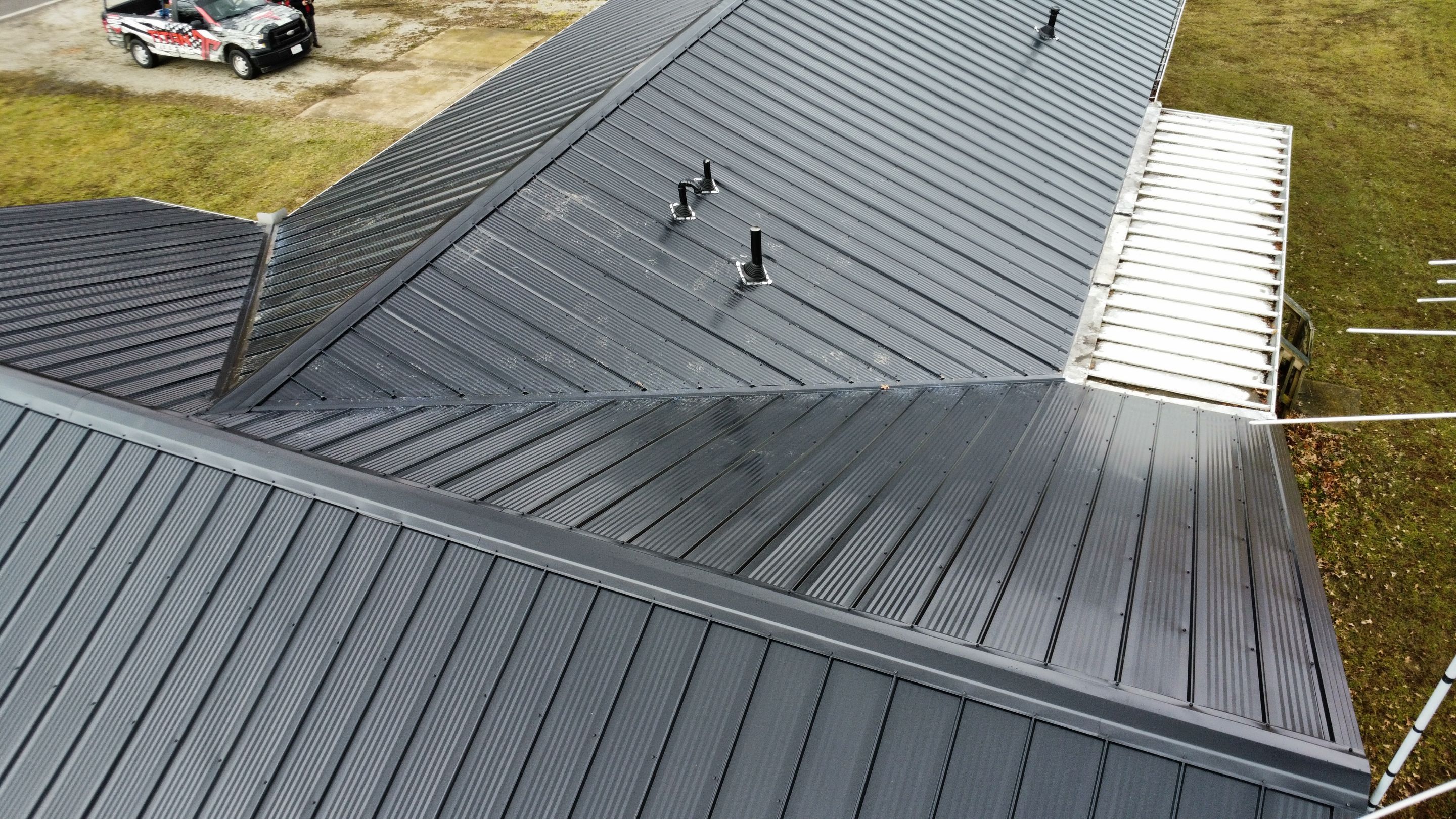 Residential 26 Gauge M-Rib Metal Roof + Gutters, Downspouts & Gutter Covers Install  by Titan Commercial & Residential Roofing 