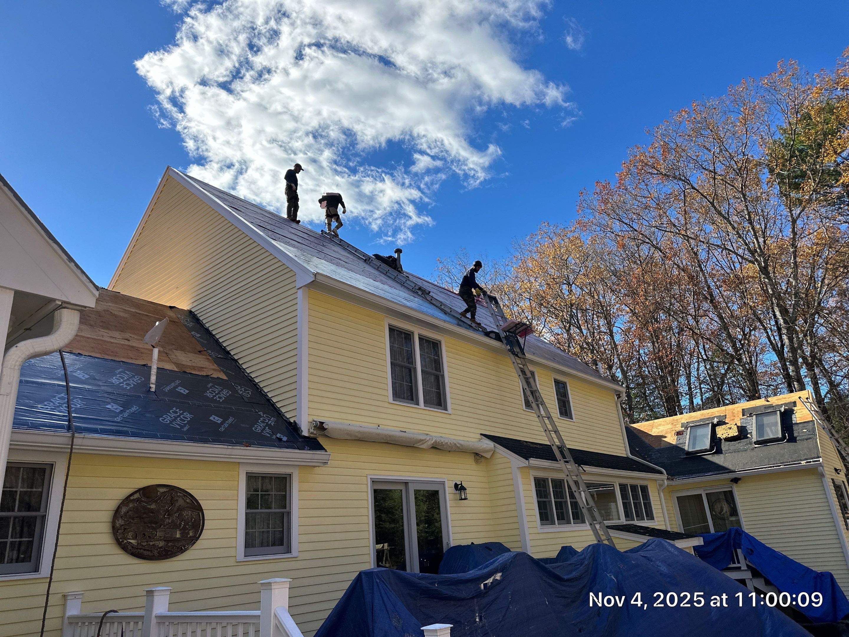 Chelmsford Premium Roof: Onyx Black Shingles with Standing Seam Metal Porch by Mighty Dog Roofing of Greater Middlesex County