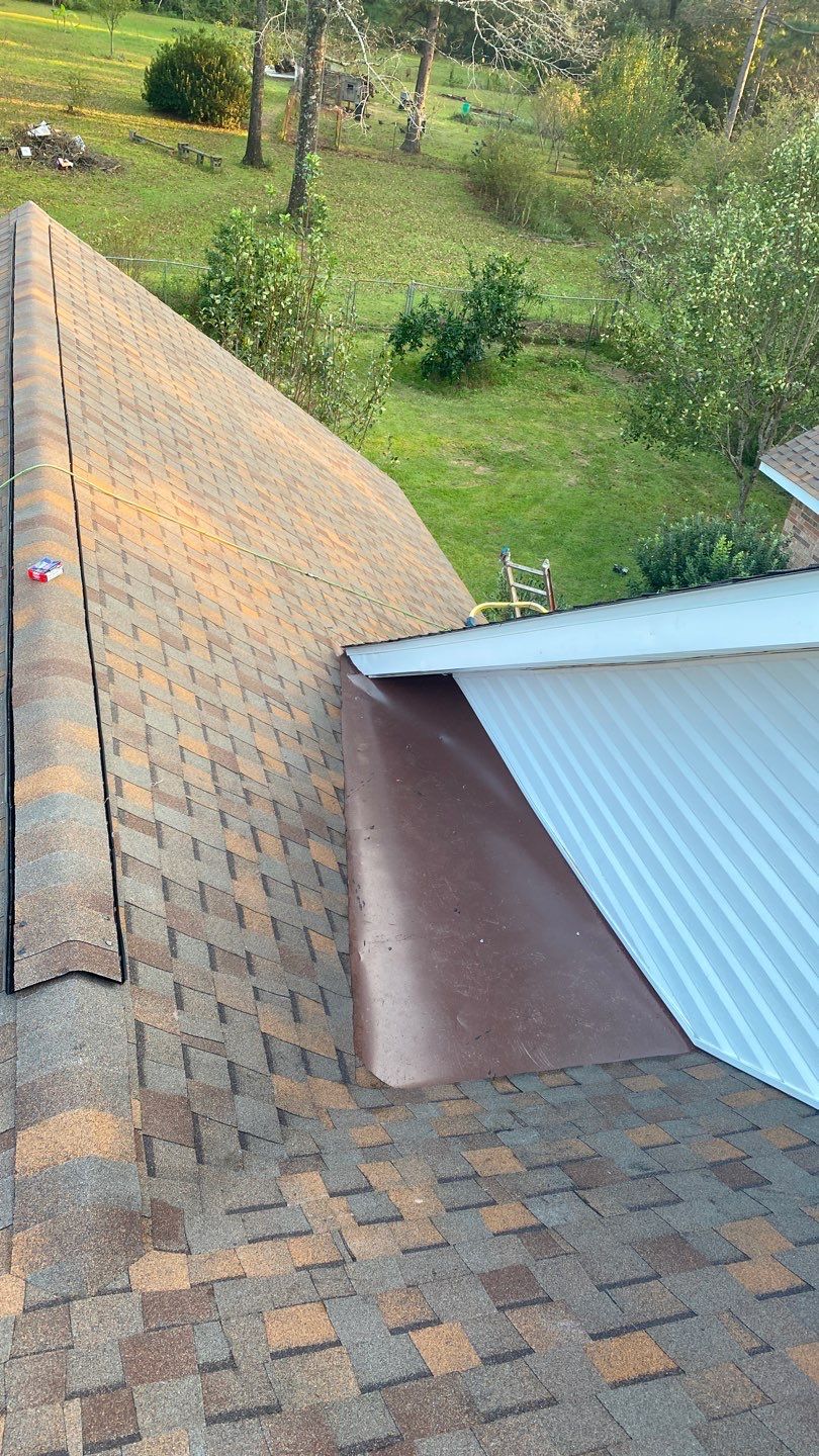 Residential Roofing Installation using Roof Replacement by American Roofing & Construction LLC