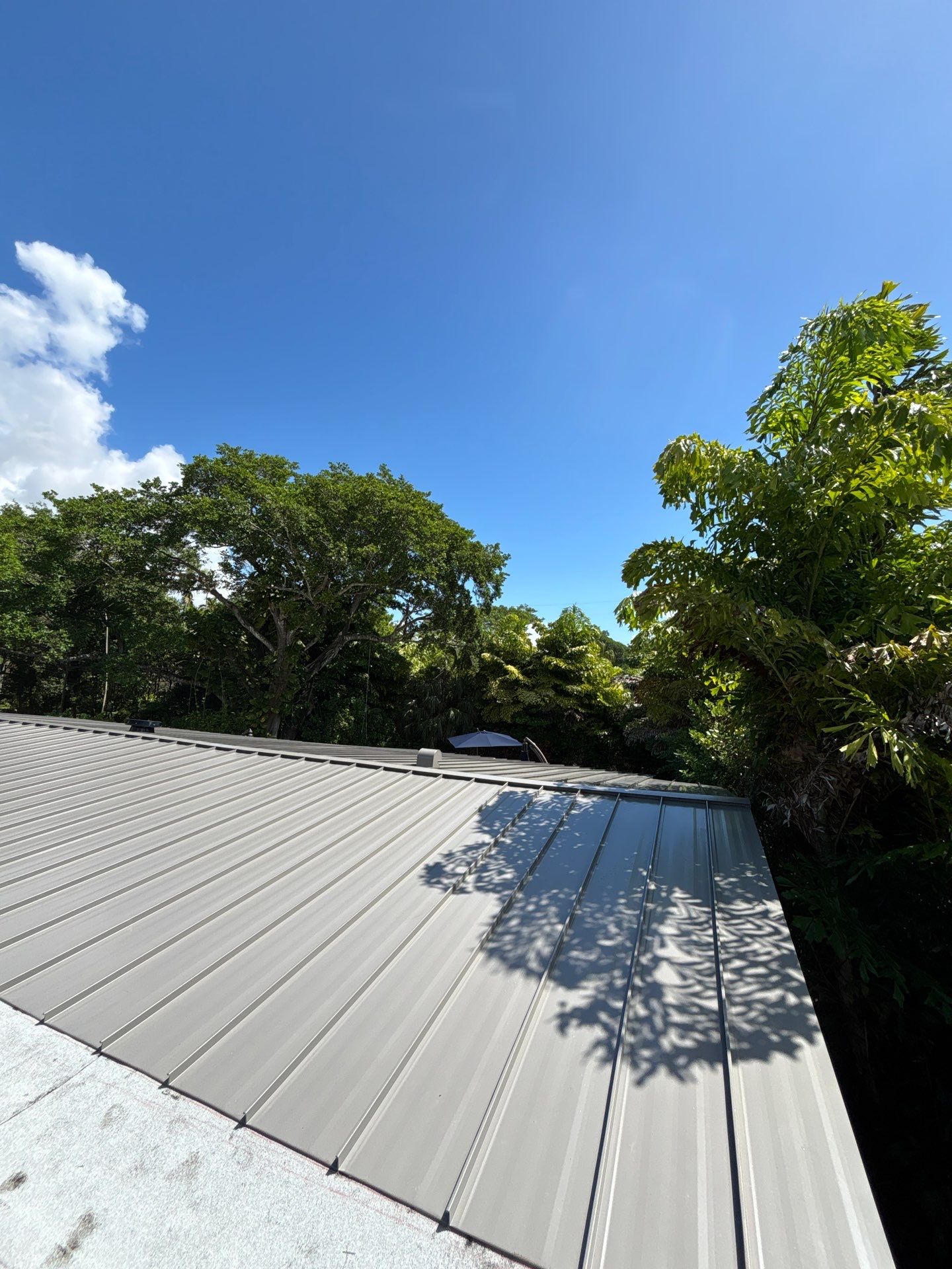 Metal Roof Replacement by Art's Roofing & Construction