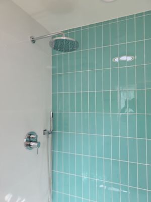 Scope of Work: Installation of Shower, Toilet, Sink, Fixtures, Pipes, and Seals