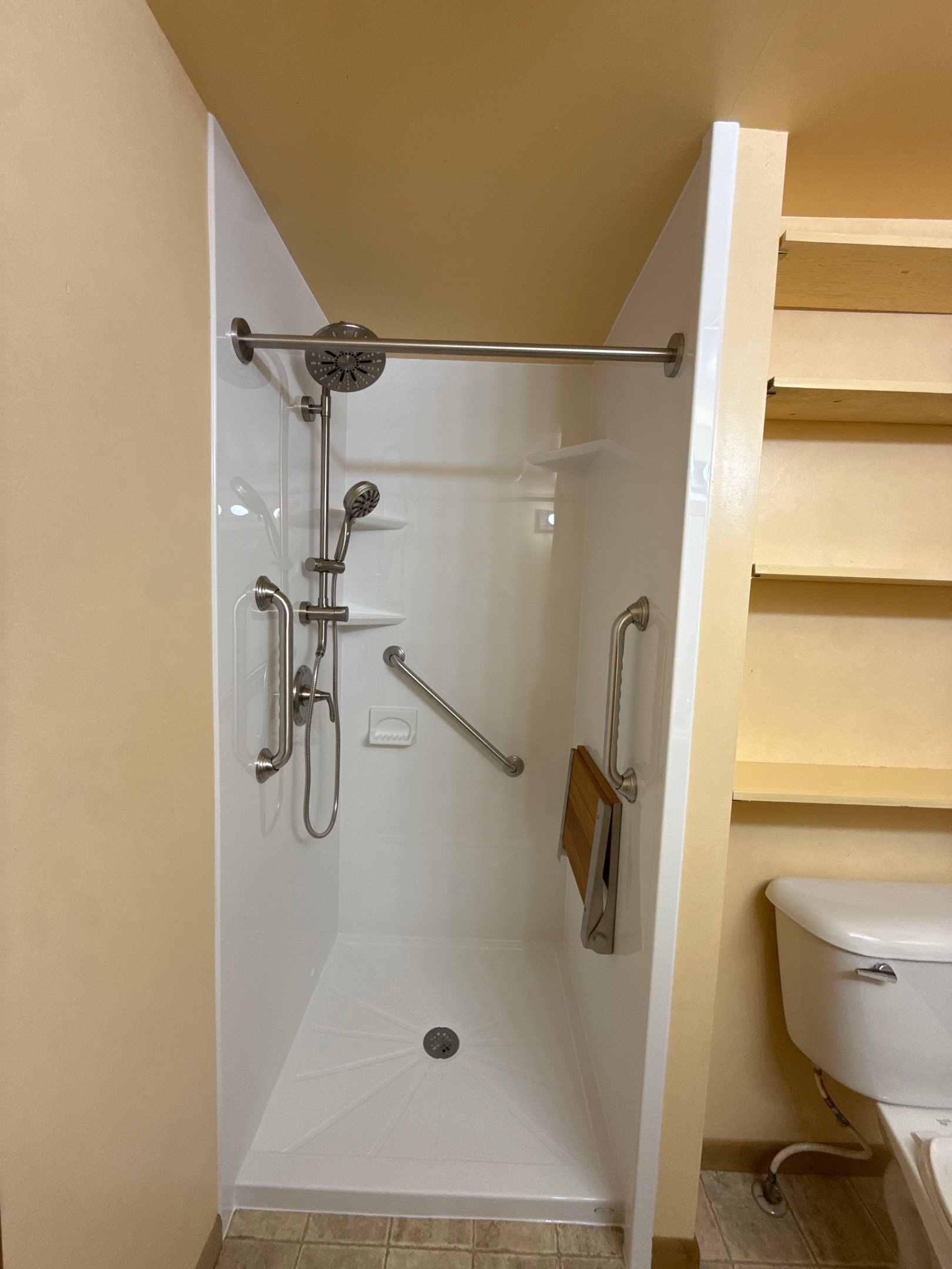 Walk-In Shower Remodel with Accessibility Features in Traverse City by Rainbow Seamless Systems