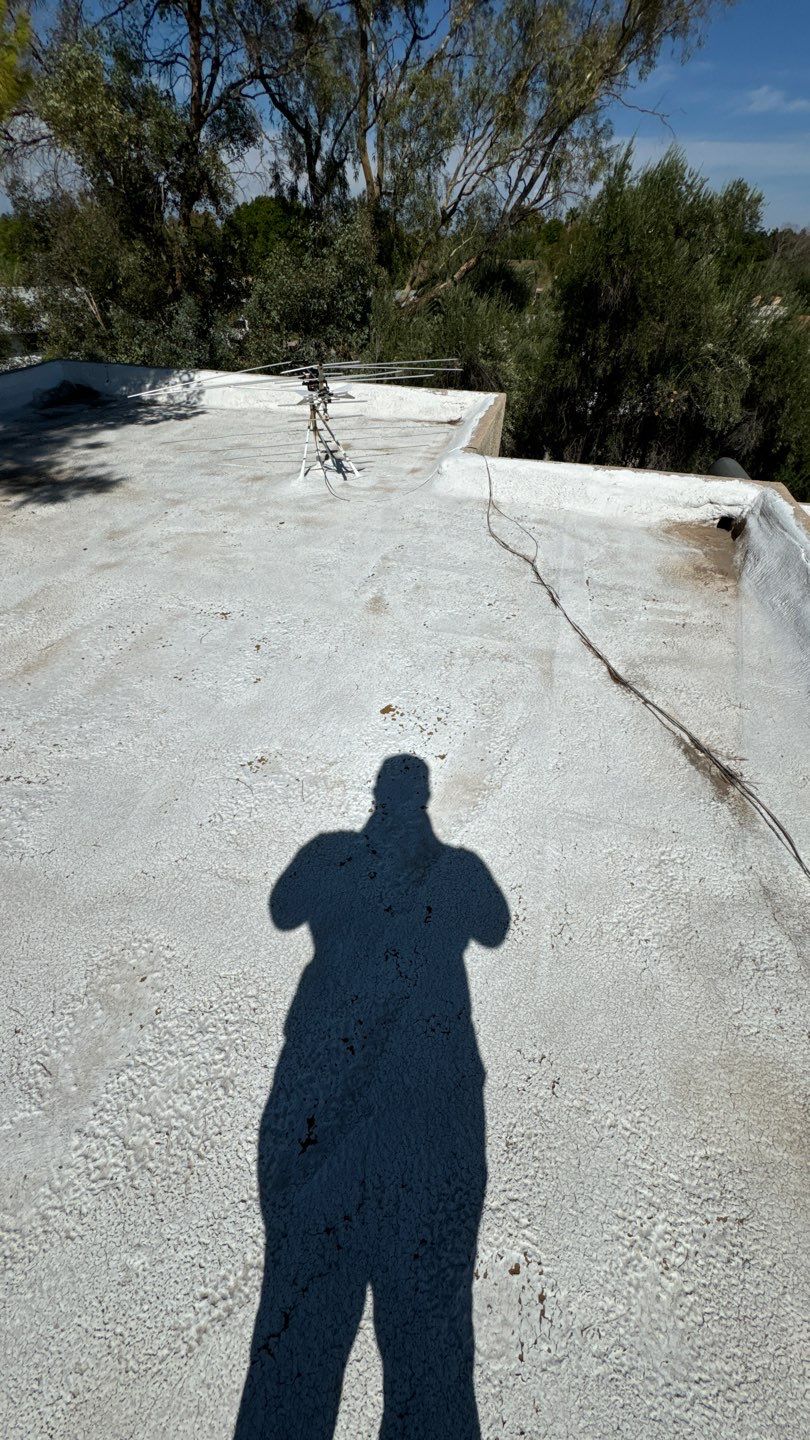 Re-coat & Tile Job by All Storm Roofing & Construction