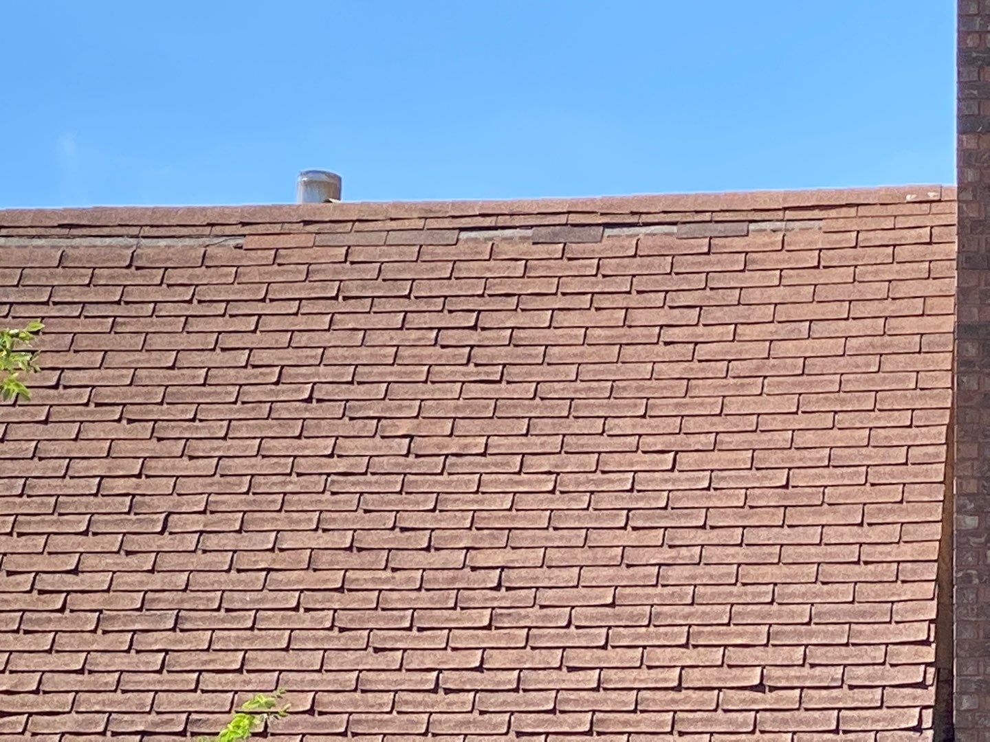Asphalt Roof Replacement with Aluminum Gutter Installation by Custom Installations
