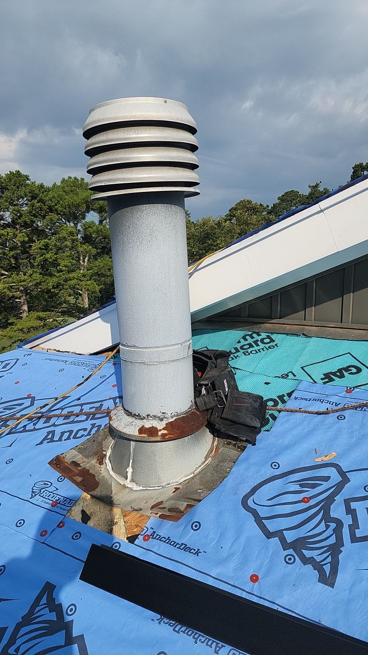 Country Club Roofing Installation by Reset Roofing