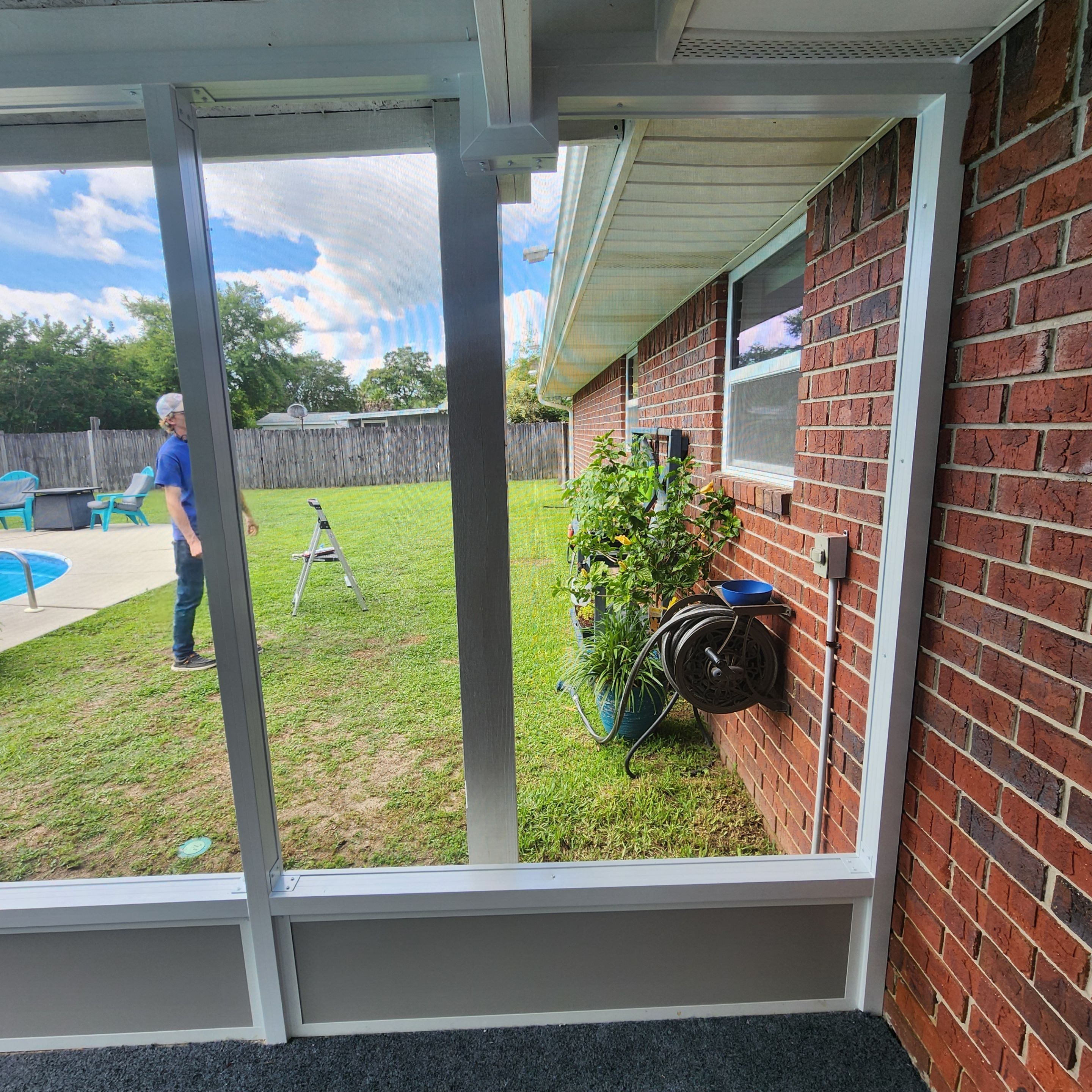 Screen Room Built Under Existing Roof by Titan Sunrooms