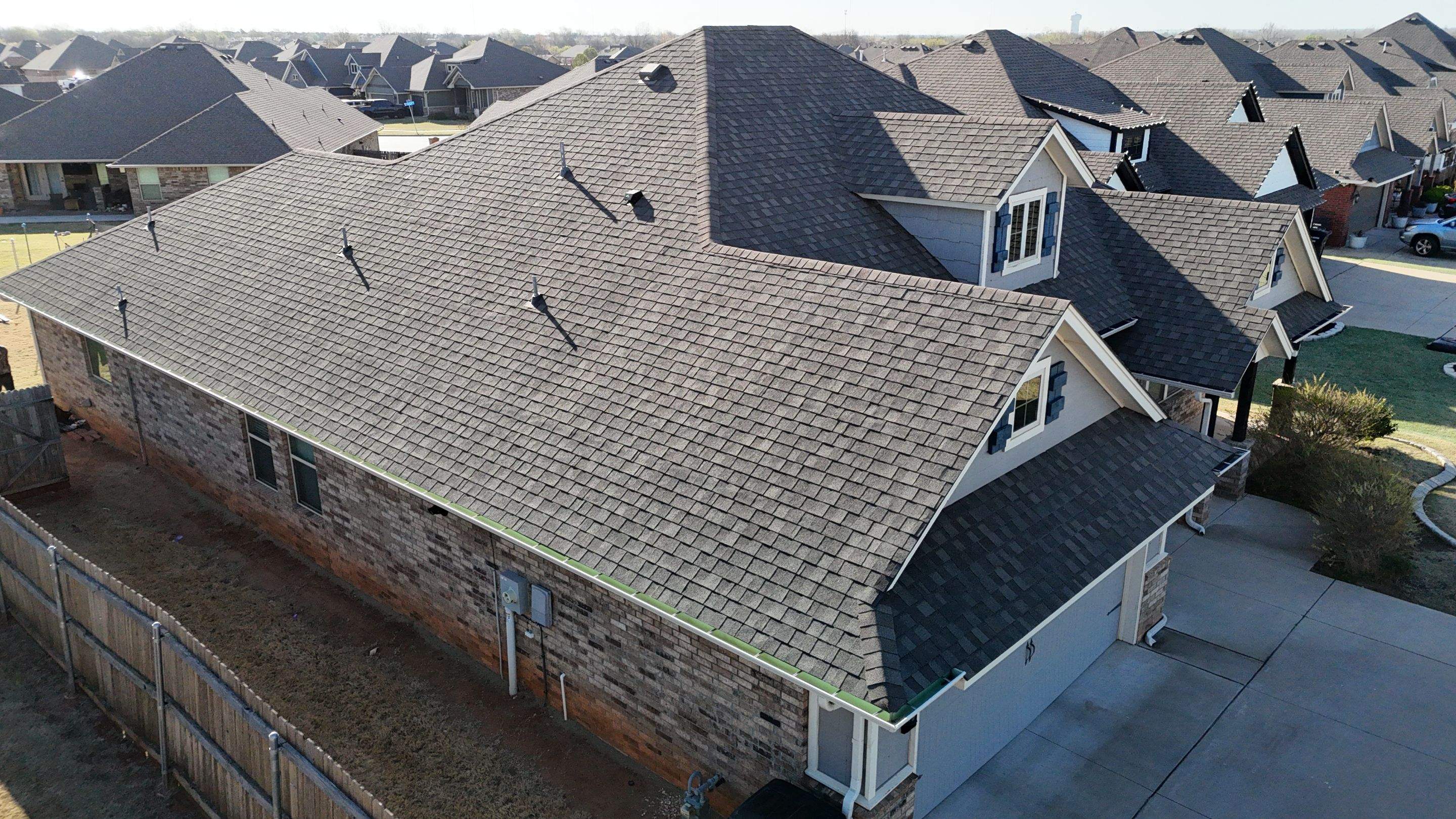 Total Home Transformation - Roof, Fence, Gutters & Paint - Oklahoma City, OK by 5Coat Roofing & Construction