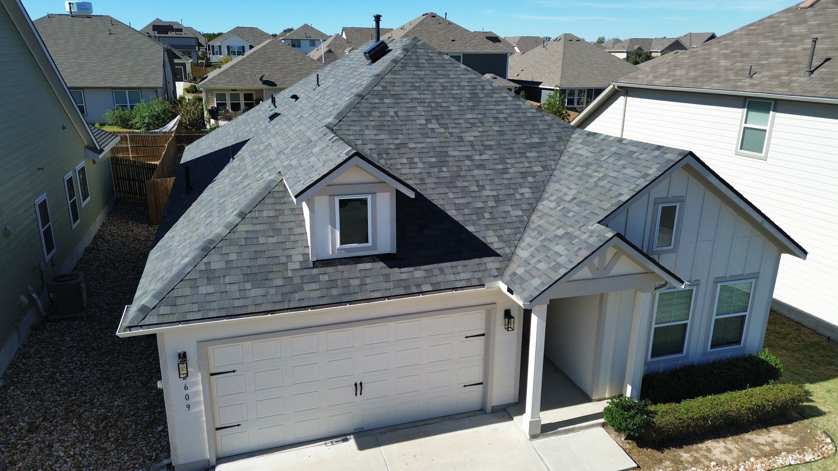 Malarkey Vista AR – Storm Grey Roof + Solar Attic Fan | Leander, TX Installation by Kstylez Roofing & Construction