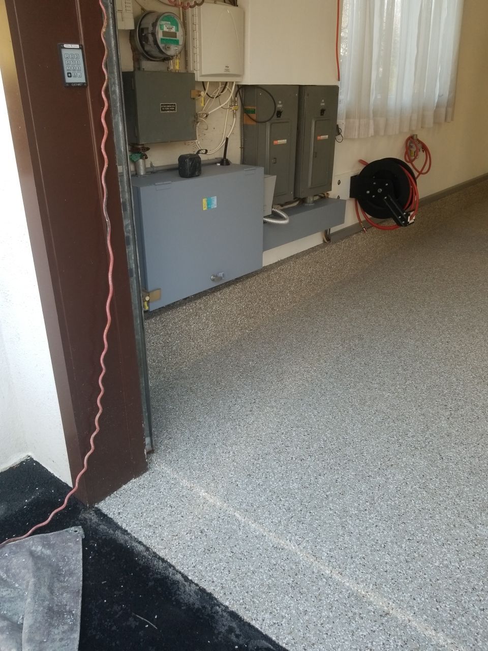 Garage Floor Coating using Penntek in Pebble Beach by Spectrum Painting, LLC