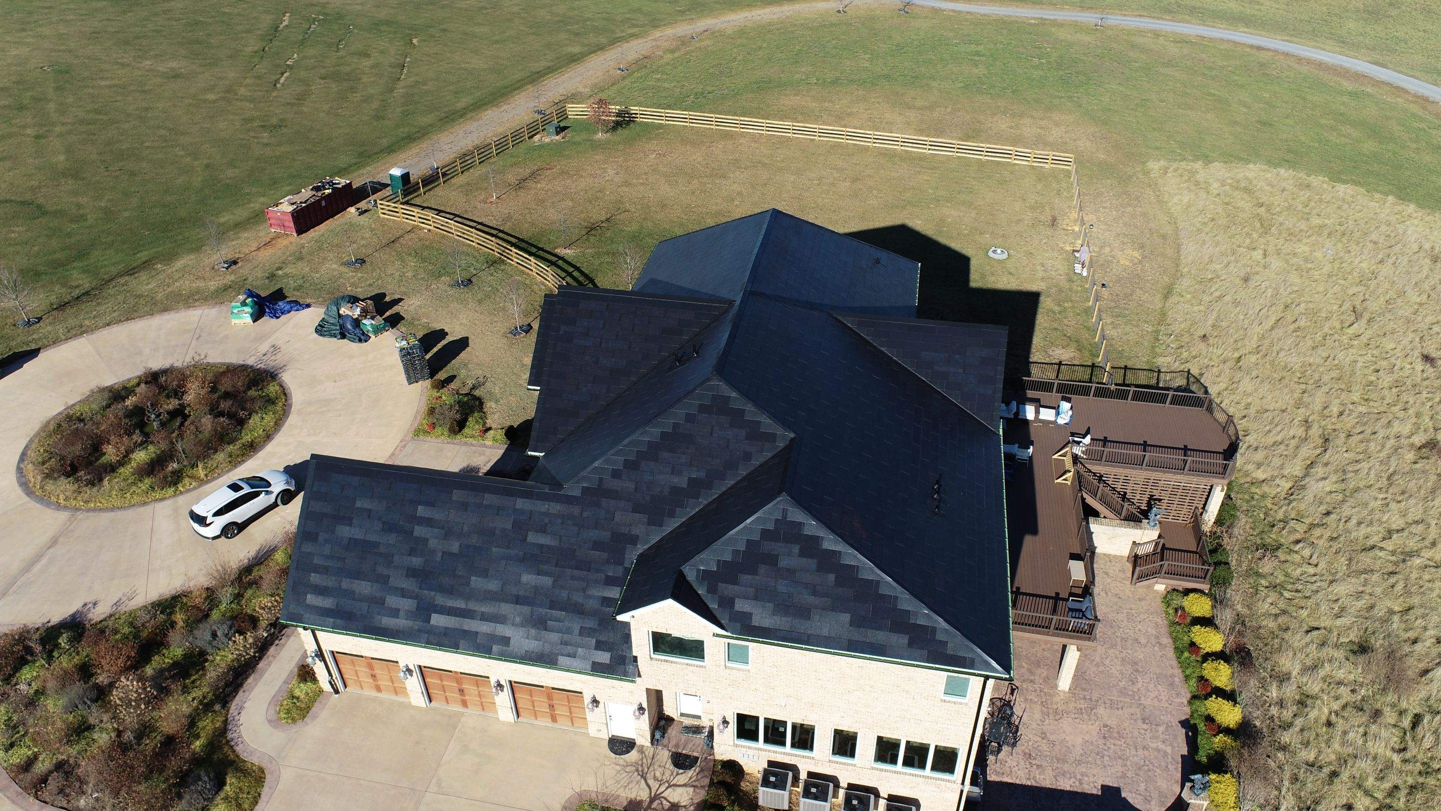 Tesla Solar Roof Replacement by American Home Contractors