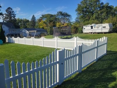 White Vinyl Spaced Picket Fence Installation in Waterloo