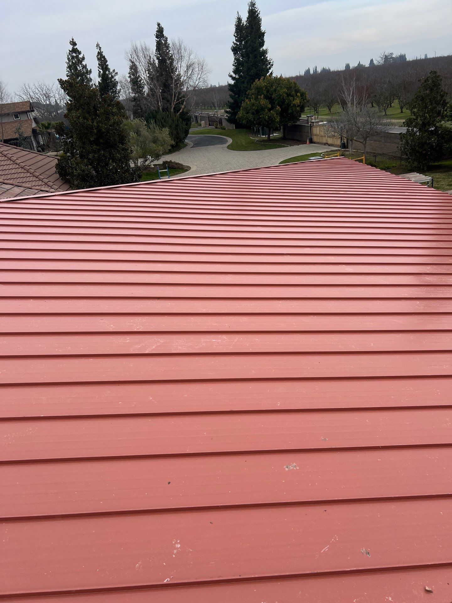 Tile, Metal, and TPO roofing project (new construction) by Straight Edge Roofing Inc