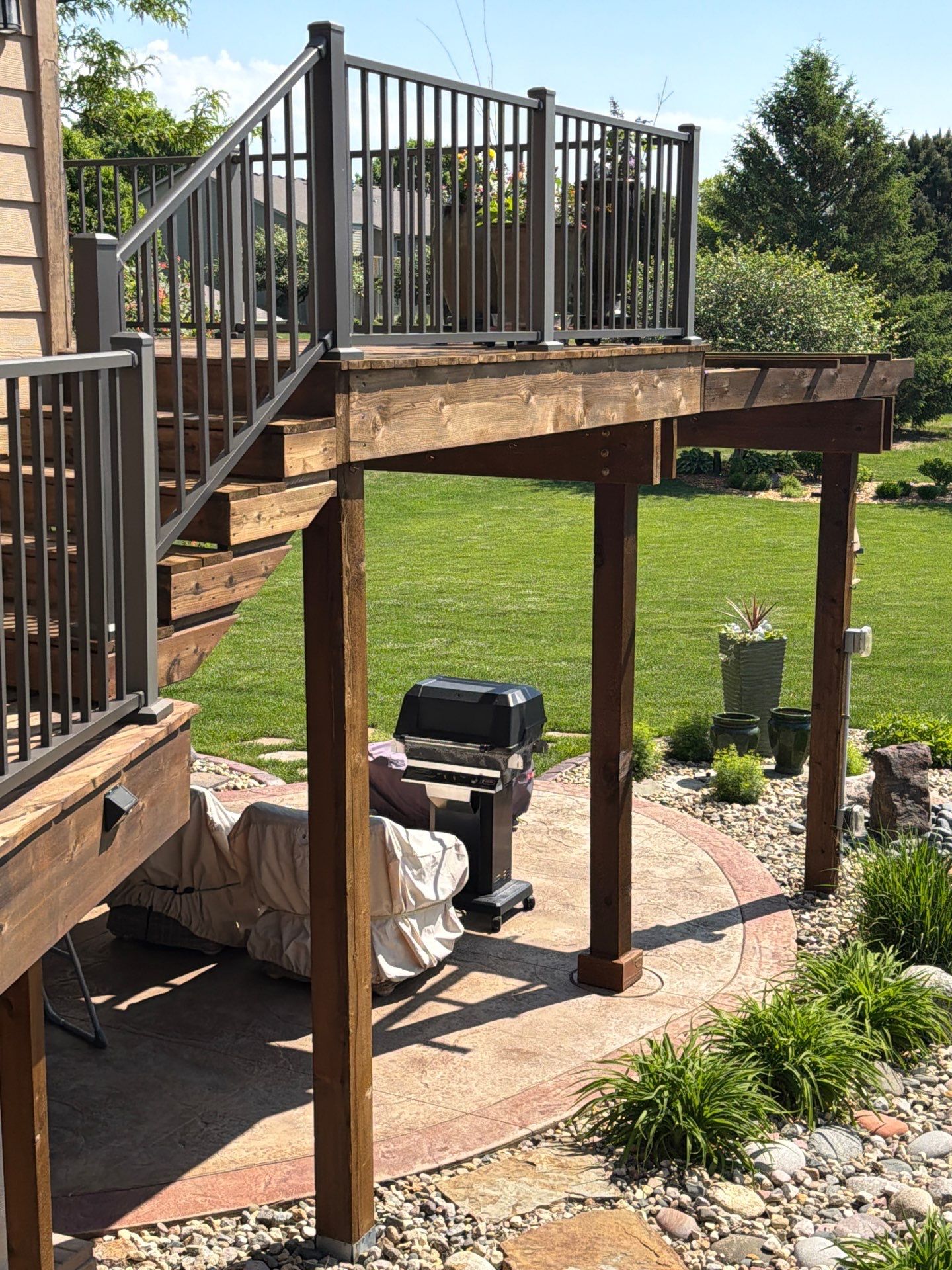 Tiered Wood Deck and Pergola Refinishing in Sioux Falls by Select Painting, Coatings & Garage Cabinets