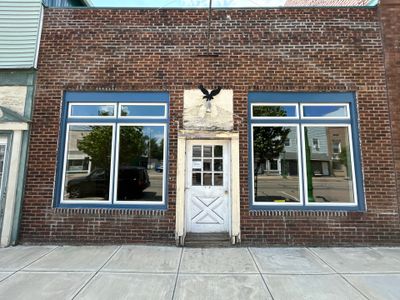 Commercial Storefront Window Boarding and Site Preparation in Sebring