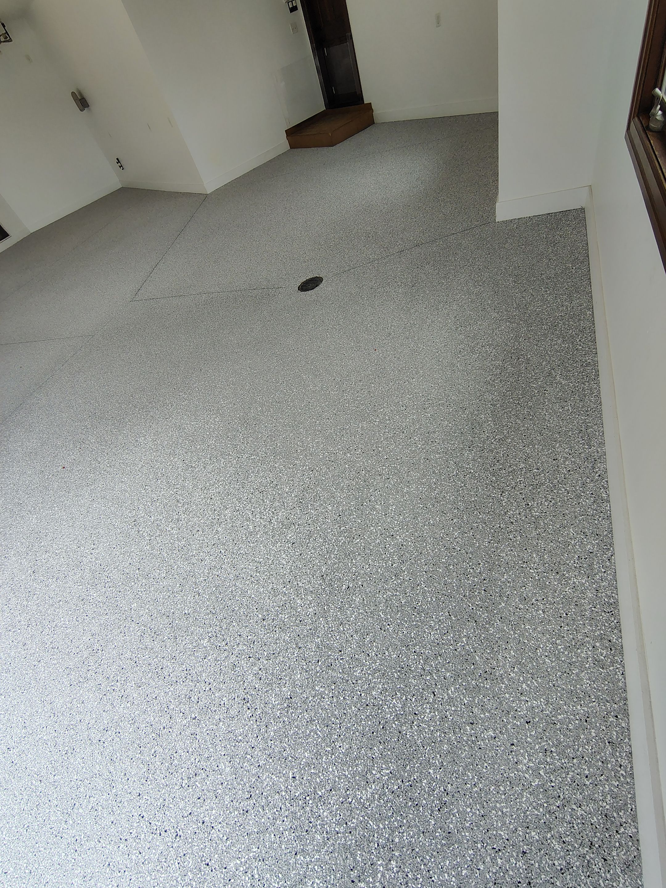Feather Grey Floor Coating in Sioux Falls, SD by Select Painting, Coatings & Garage Cabinets