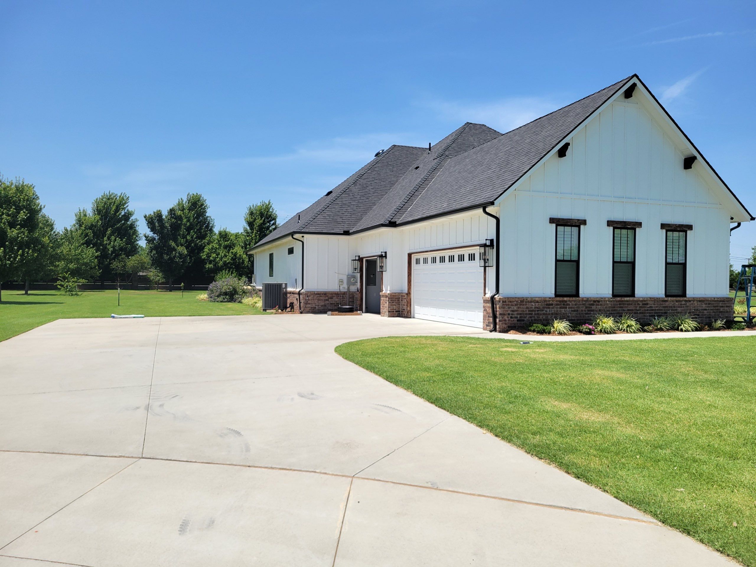 roof replacement in Goldsby by McCann's Roofing and Construction