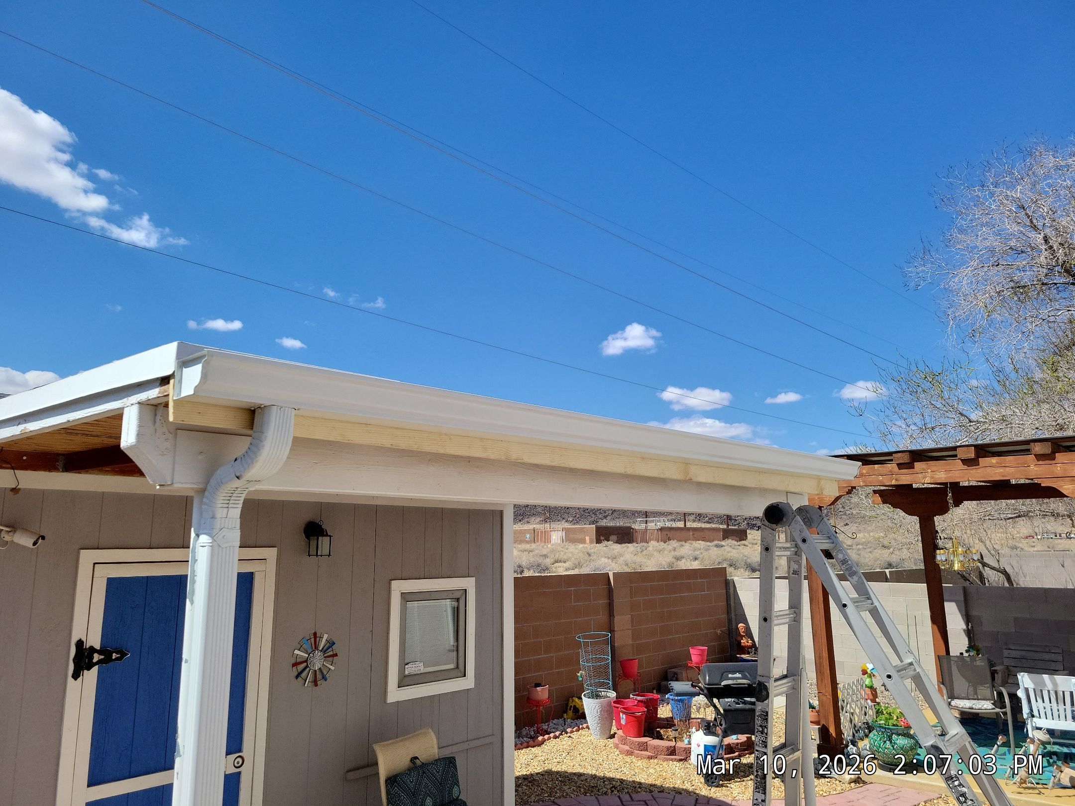 Santa Teresa St NW • Albuquerque, NM 87120 New shed roof, fascia and gutters by Doyle Roof Masters Inc