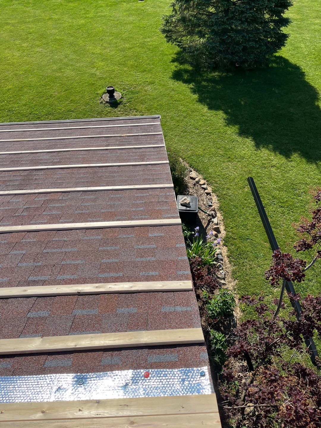 Residential Roofing Installation using Perfromance Panel Metal - Black by RoofX 