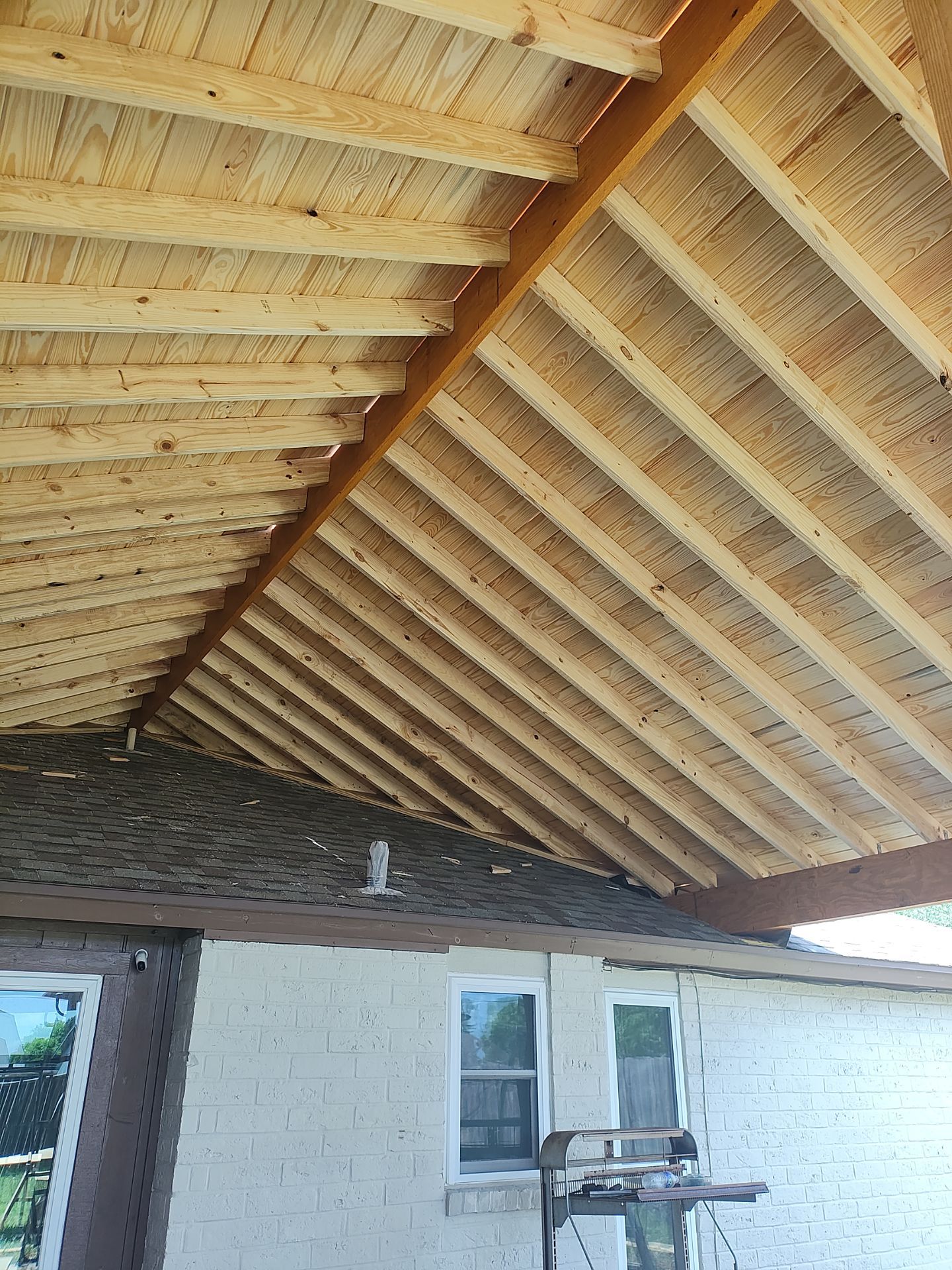 Patio? We got you Covered! by Bayfront Roofing and Construction