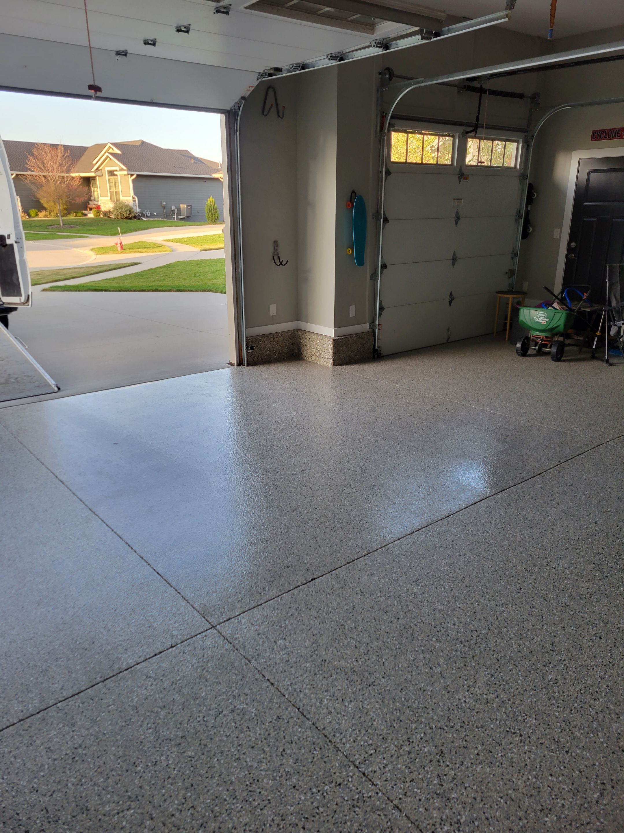 Grimes, IA Transformation: Professional Grade Garage Floor Coating by Revival Concrete Coatings