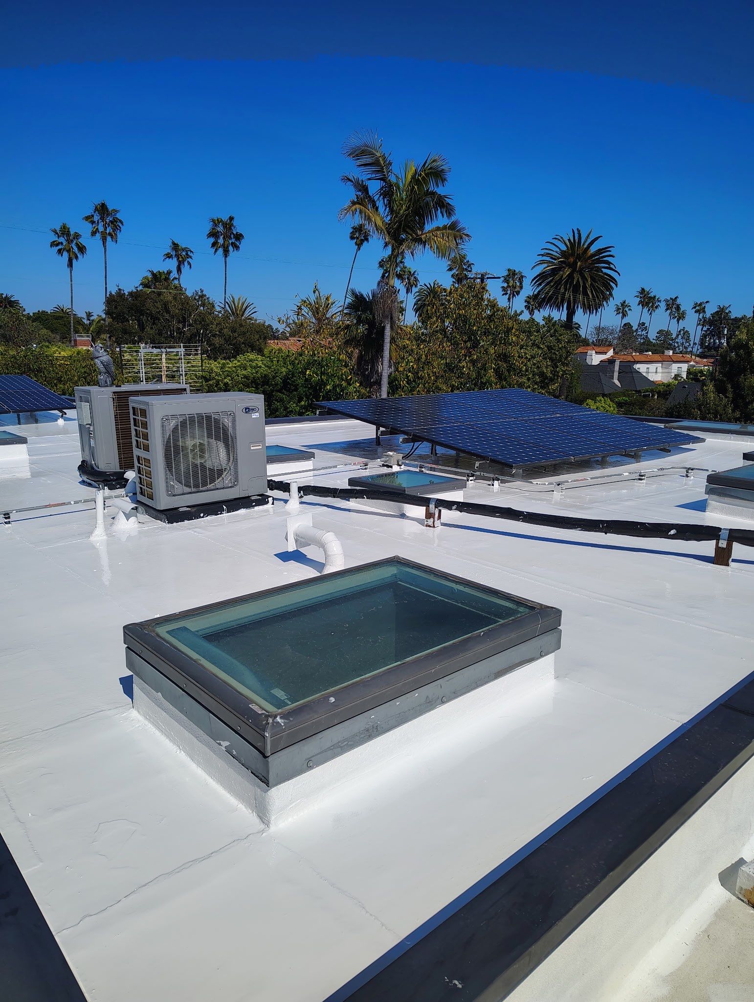 Silicone Membrane Installation using American Standard Coatings Silicone-S by Hull Brothers Roofing