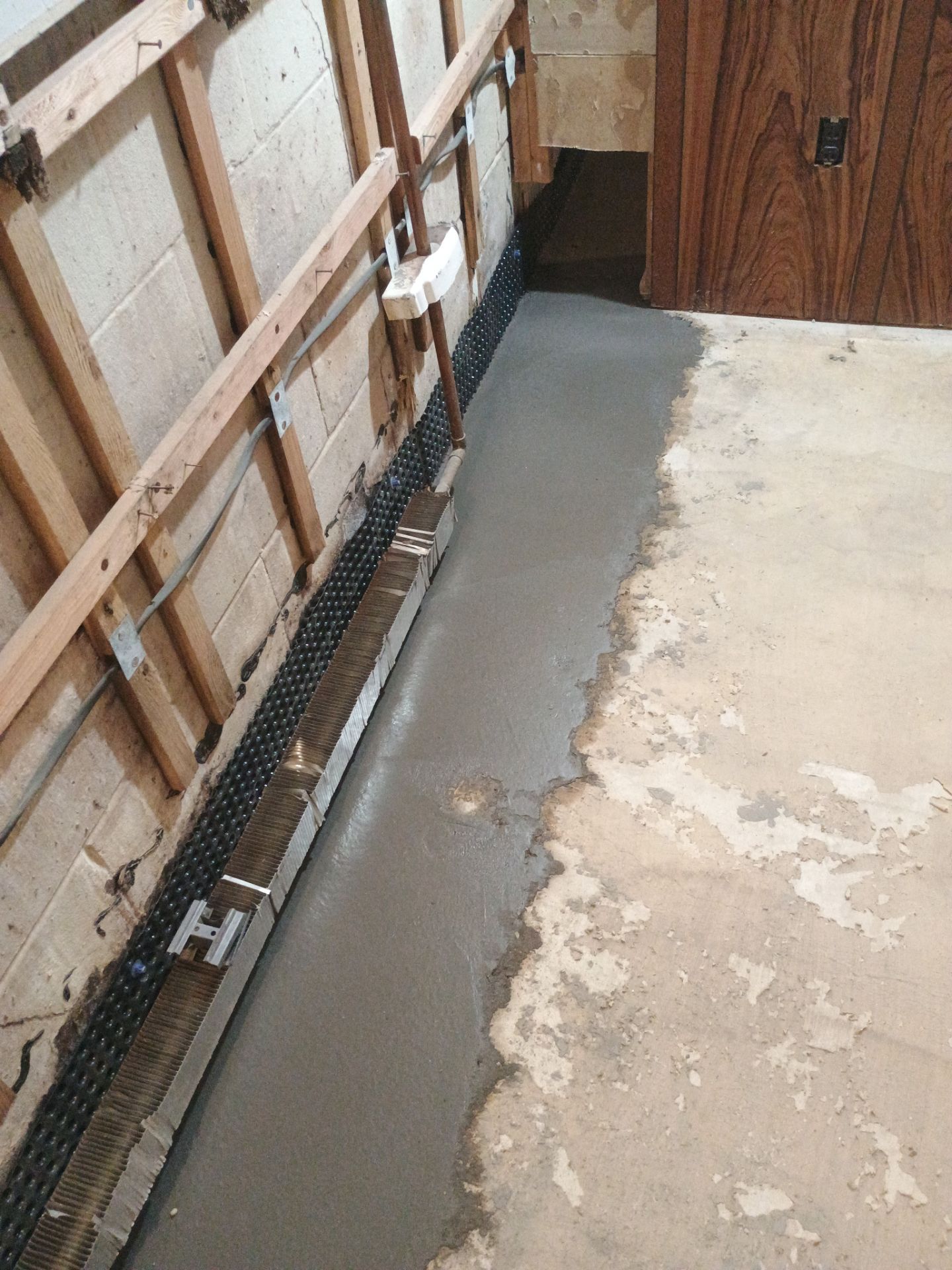 Drain Tile, Sump Pump & Buried Discharge in Columbia Heights by Waterproofing Northeast
