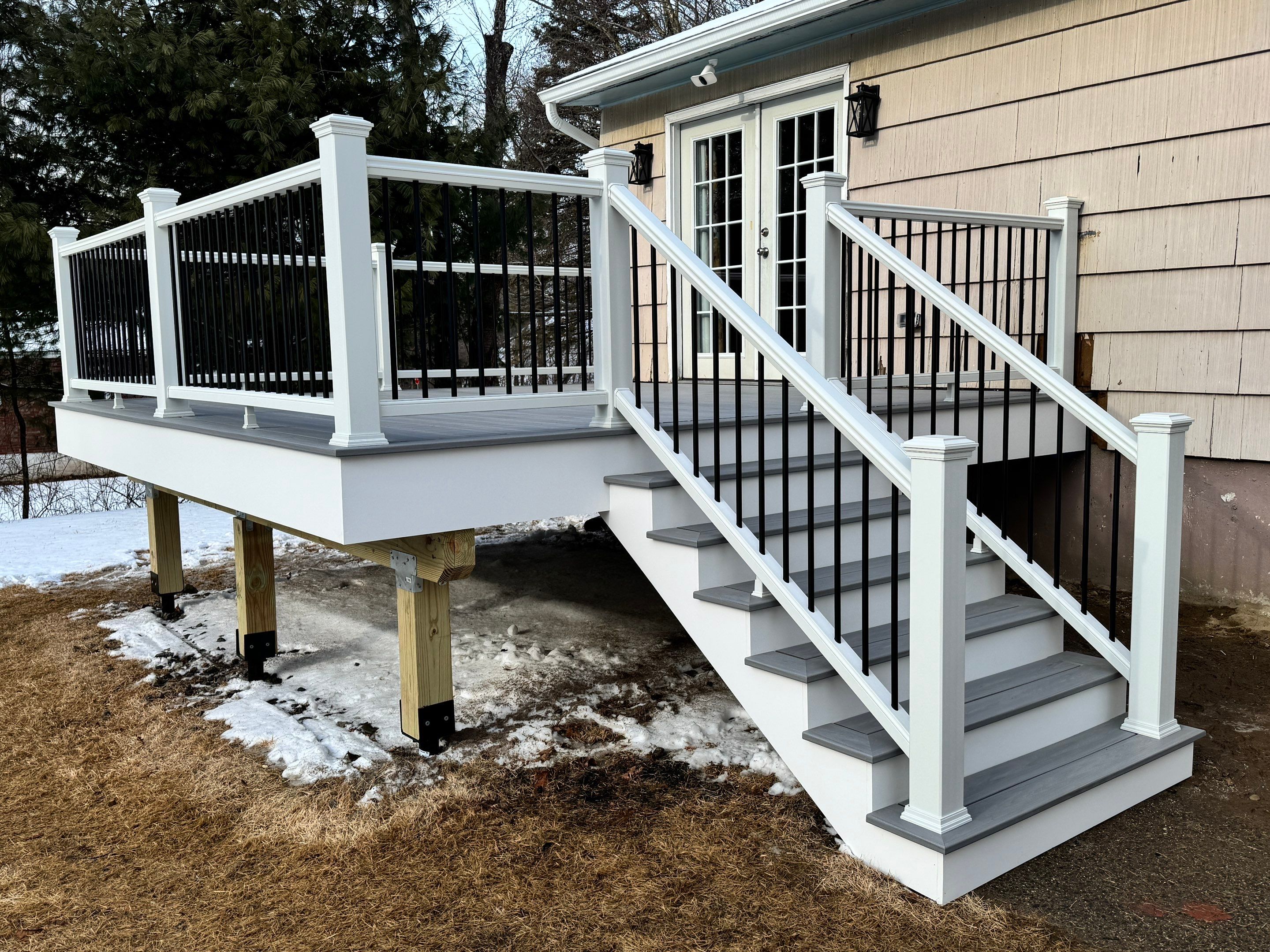 Deck replacement using Trex Lineage Rainier , and Transcend White railing.  by DiGiorgi Roofing and Siding Inc