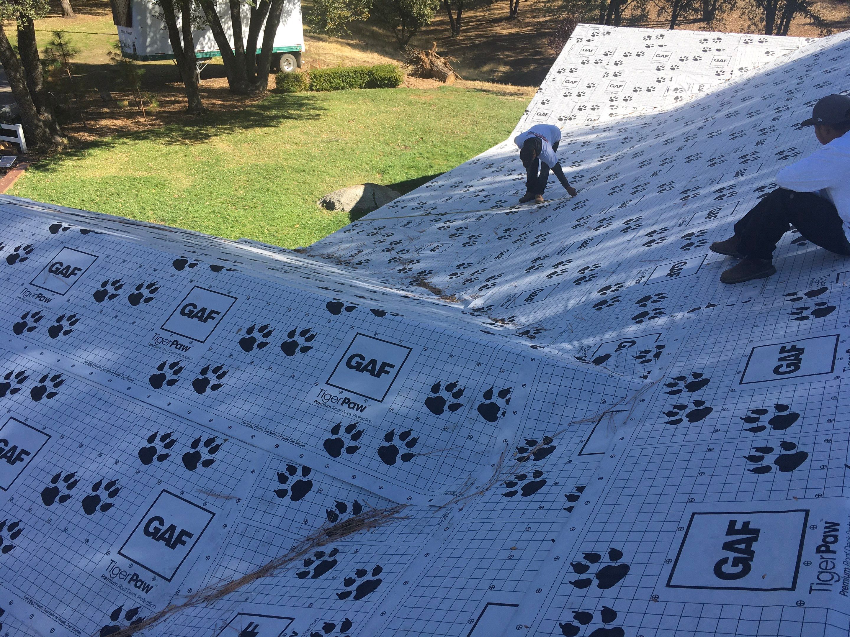 Metal roofing installation using Standing seam metal roofing system by Straight Edge Roofing Inc