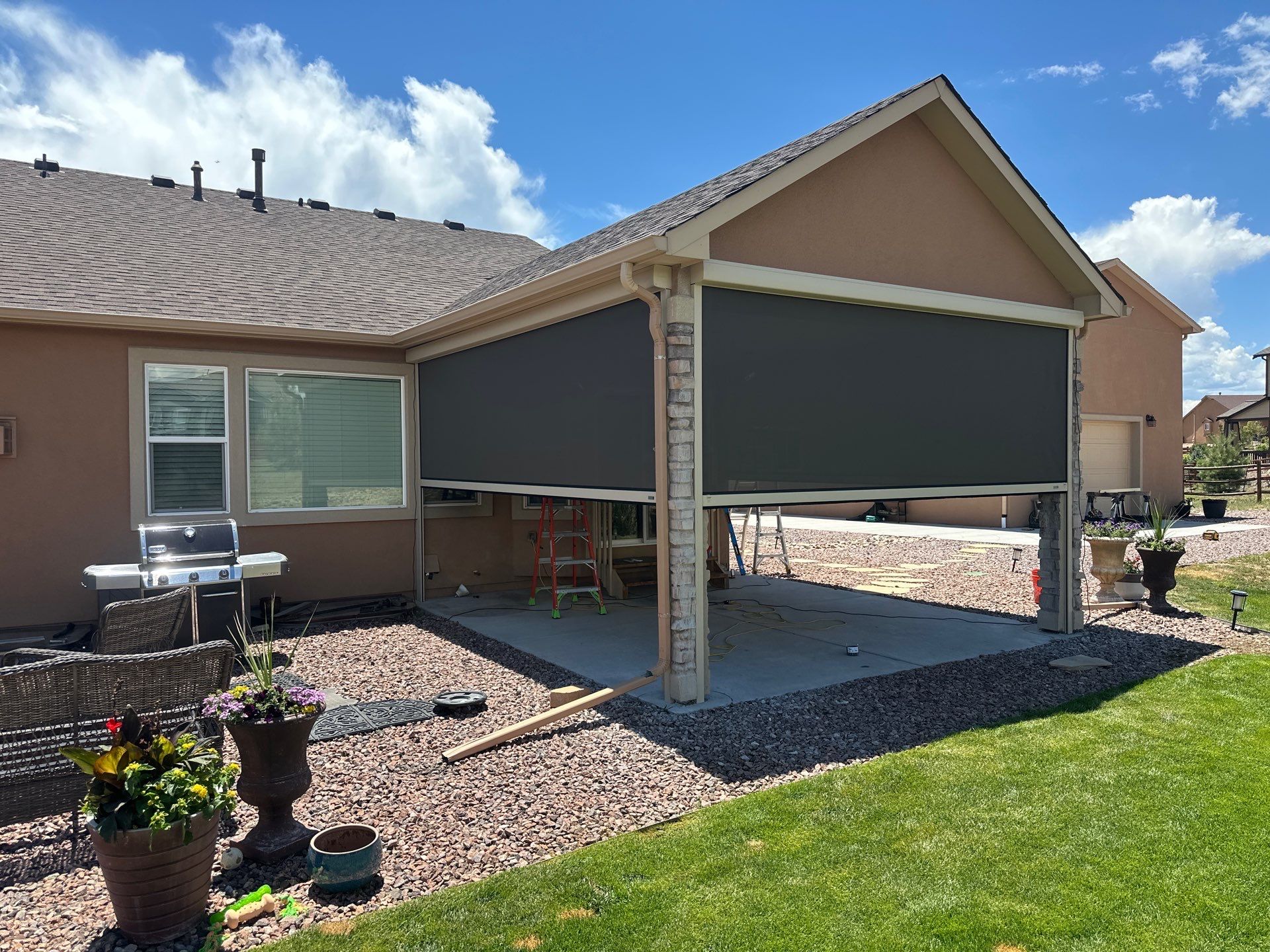 MagnaTrack Outdoor Screen Installation for a Covered Patio in Peyton by Outdoor Solutions Colorado