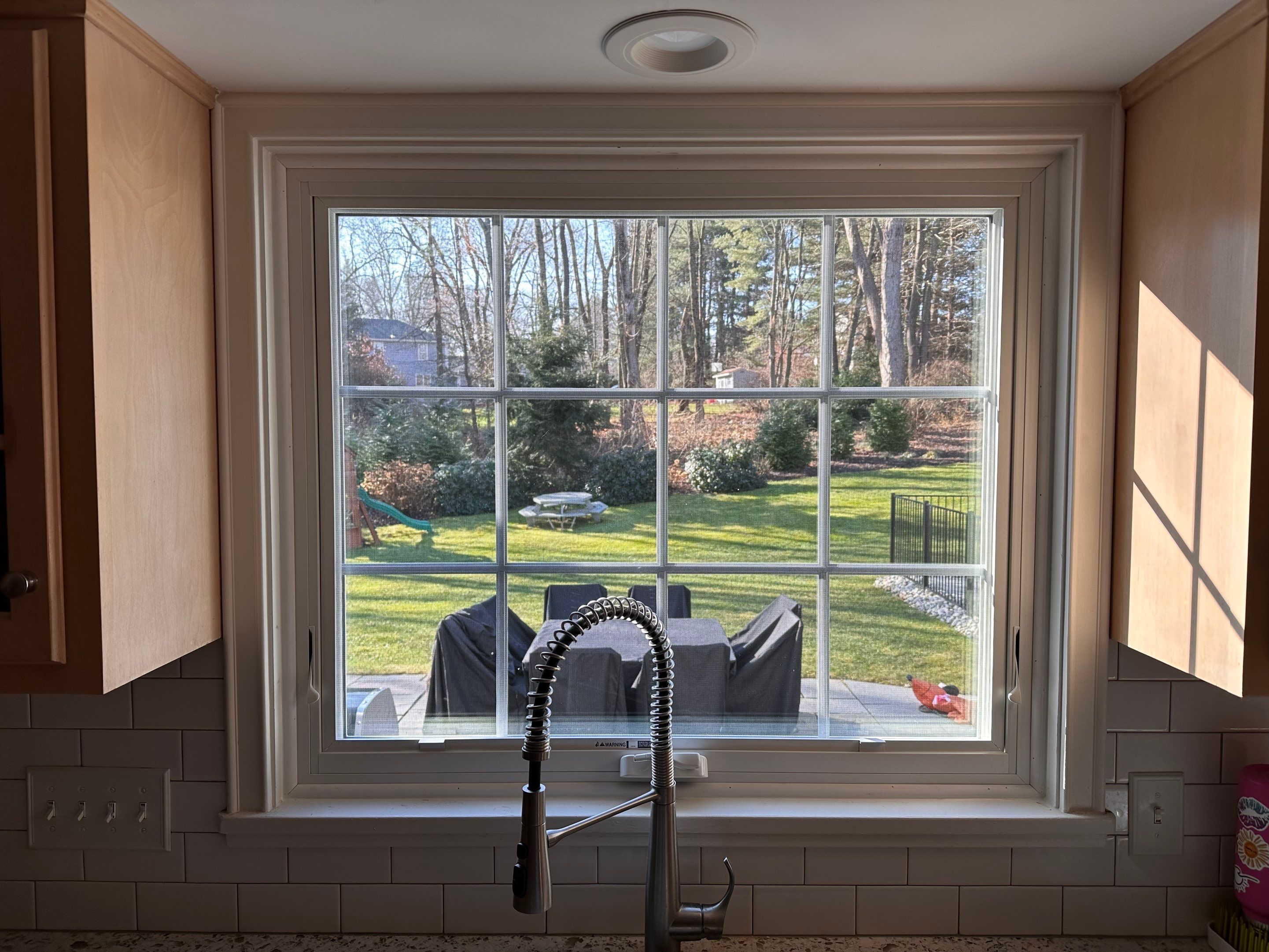 Kitchen Window Upgrade with Bright, Clean Finish by DiGiorgi Roofing and Siding Inc