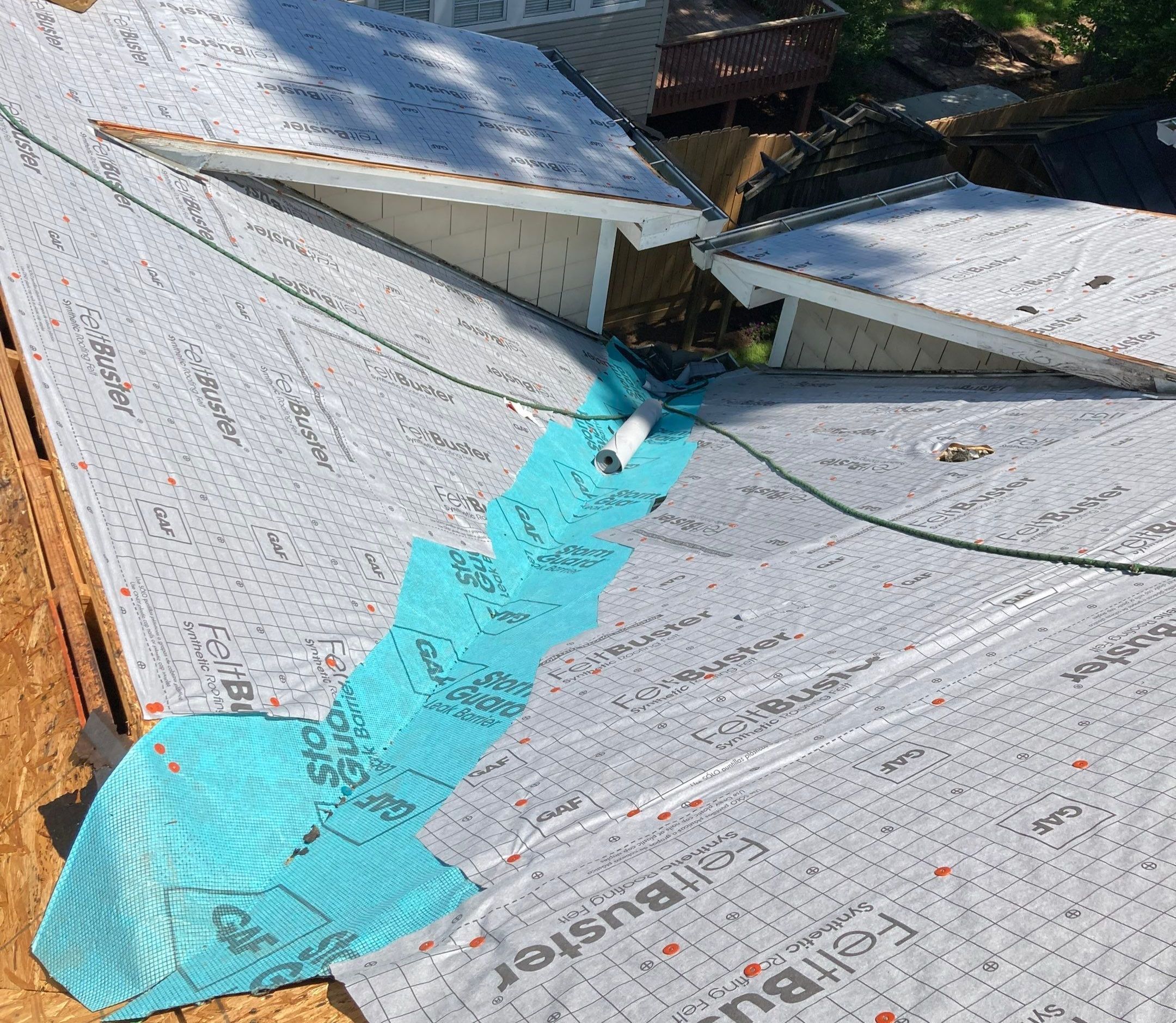 Residential Roofing Installation using Architectural Shingles by The Roofing Dudes
