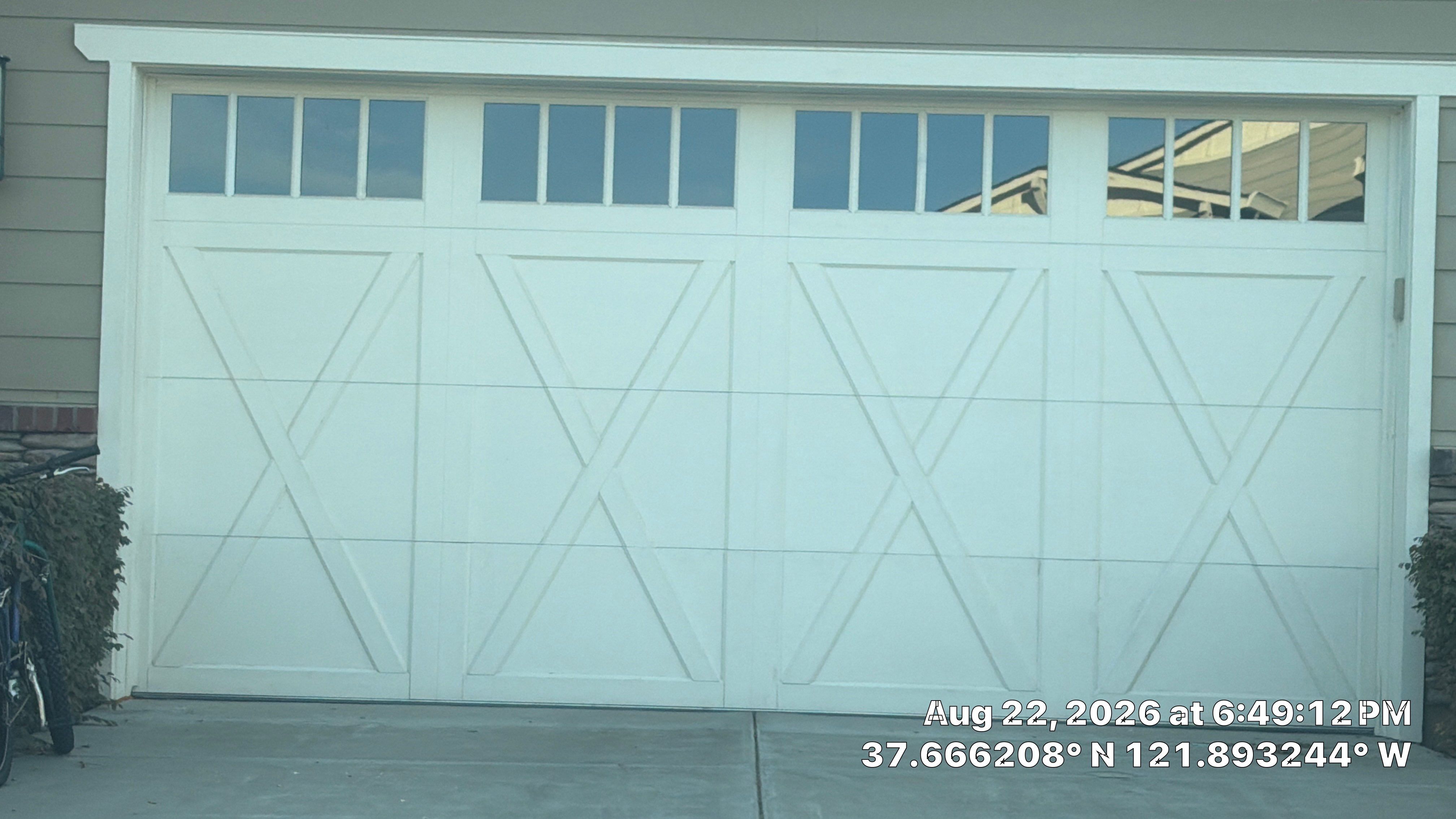 White Carriage-Style Garage Door Installation with Decorative Windows in Pleasanton by Valiant Garage Door