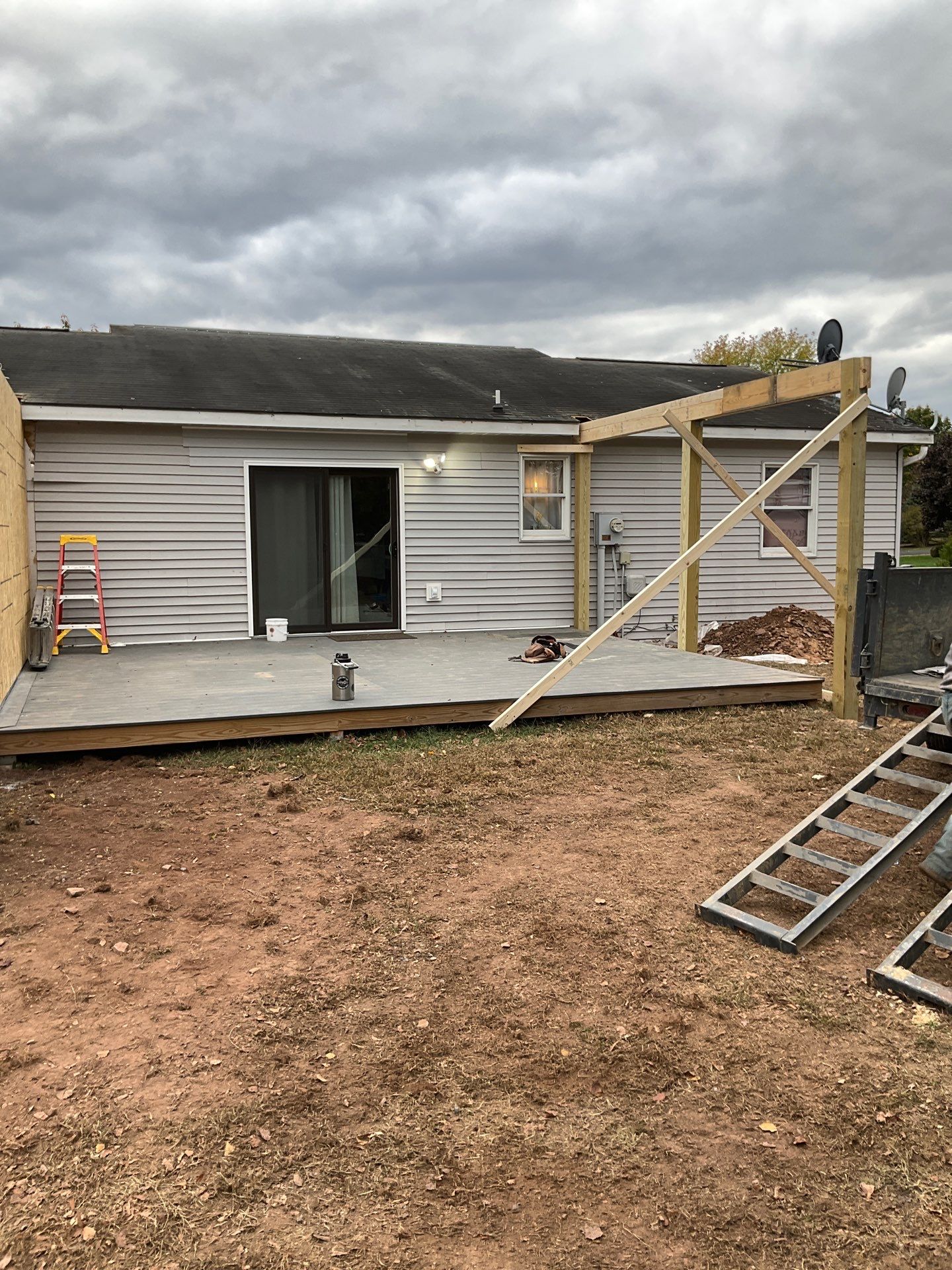 Residential Addition and Covered Porch Roof  by Esh Builders