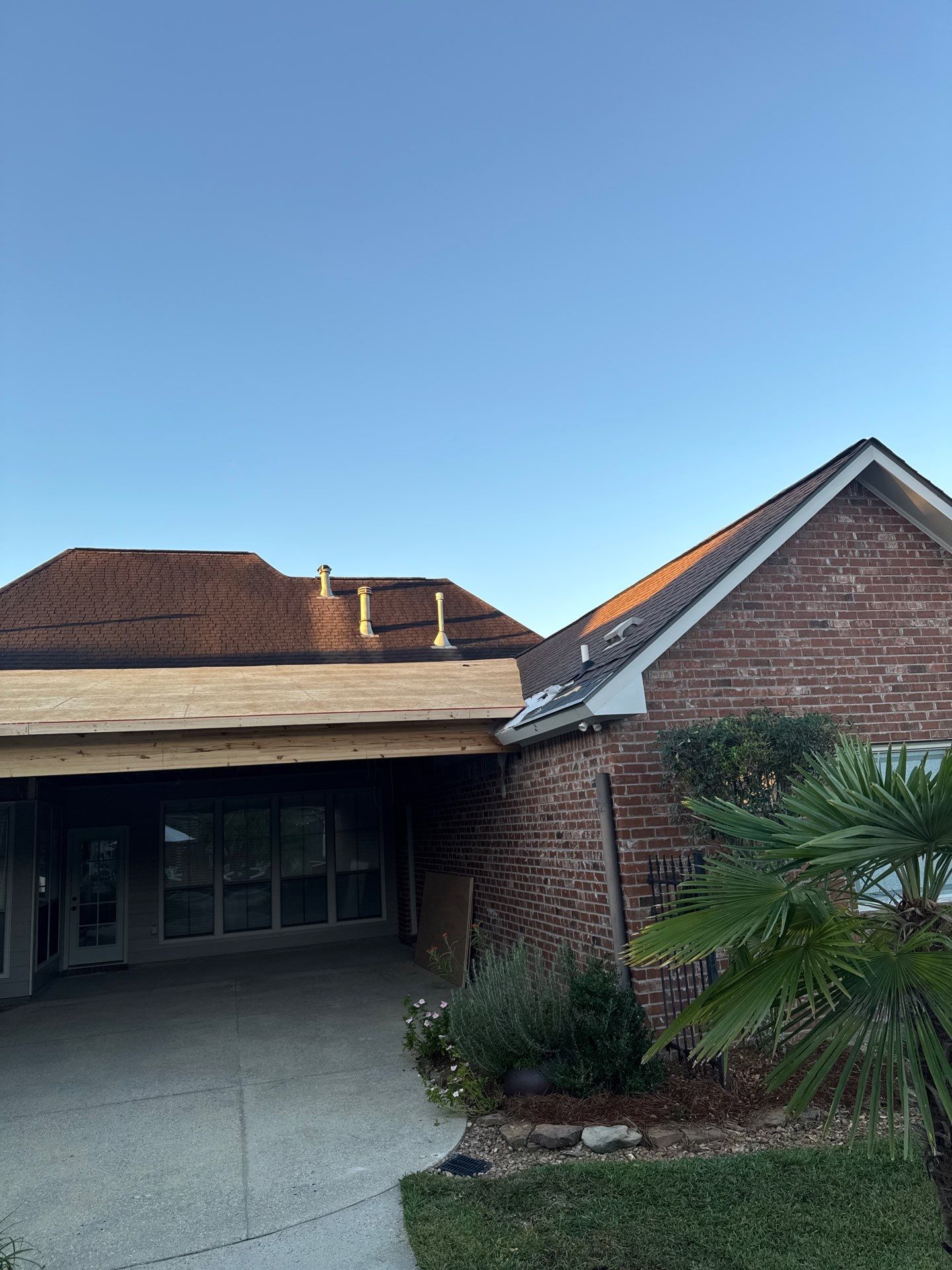 Certainteed Landmark Weathered Wood w patio extension by Top Team Roofing & Construction