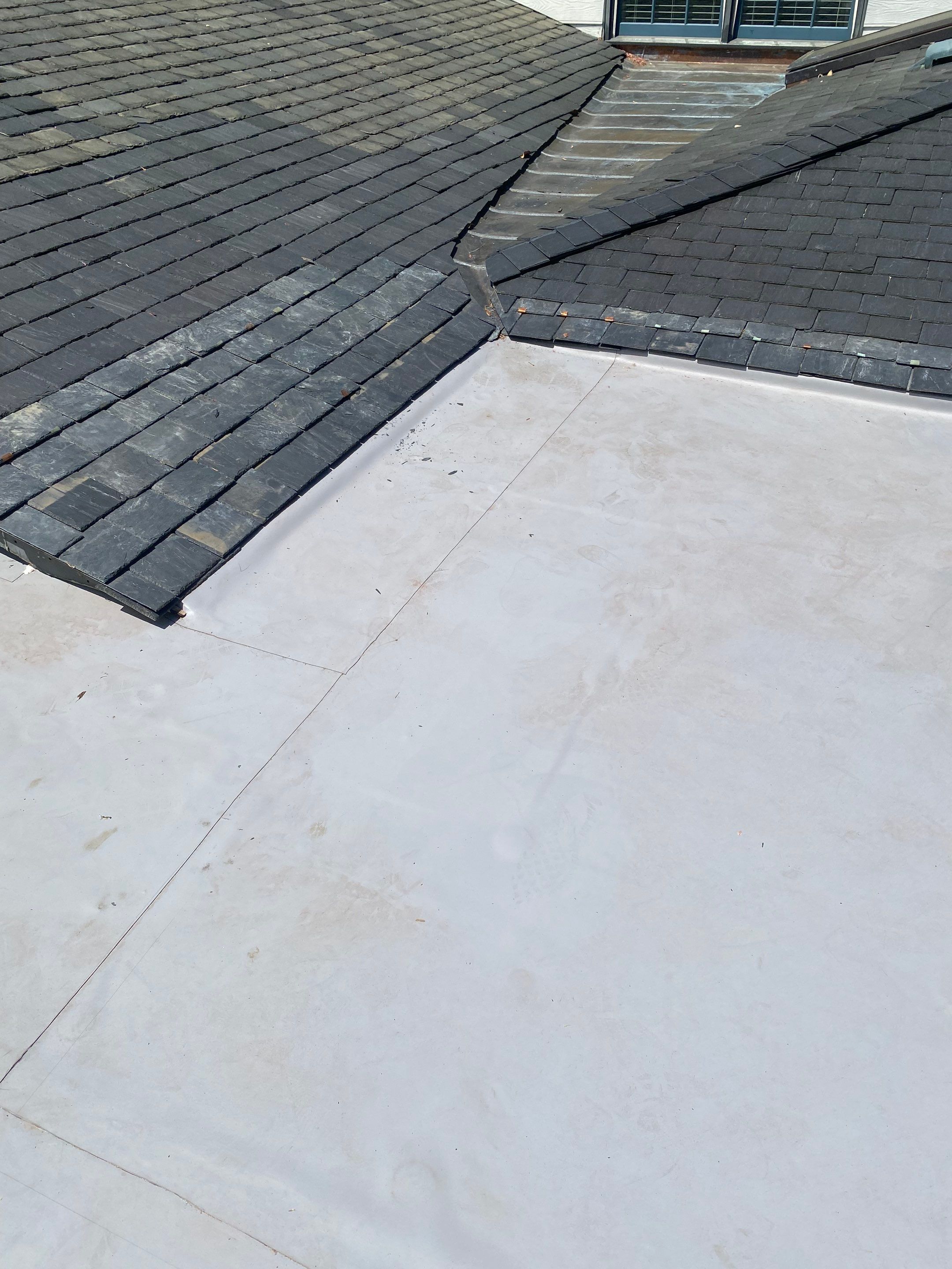 Arlington: Buckingham Slate and Carlisle Syntec TPO Roof by RM Banning, Inc.