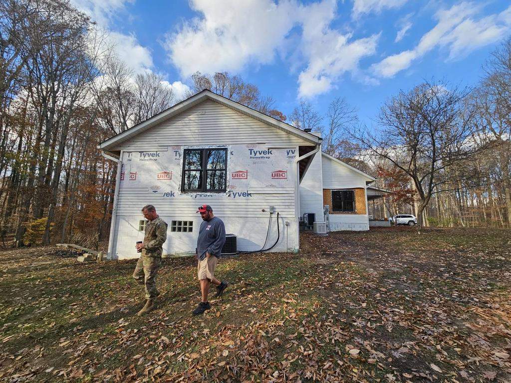 Siding Installation using Primed James Hardie & Straight Edge Shakes by Koontz Construction