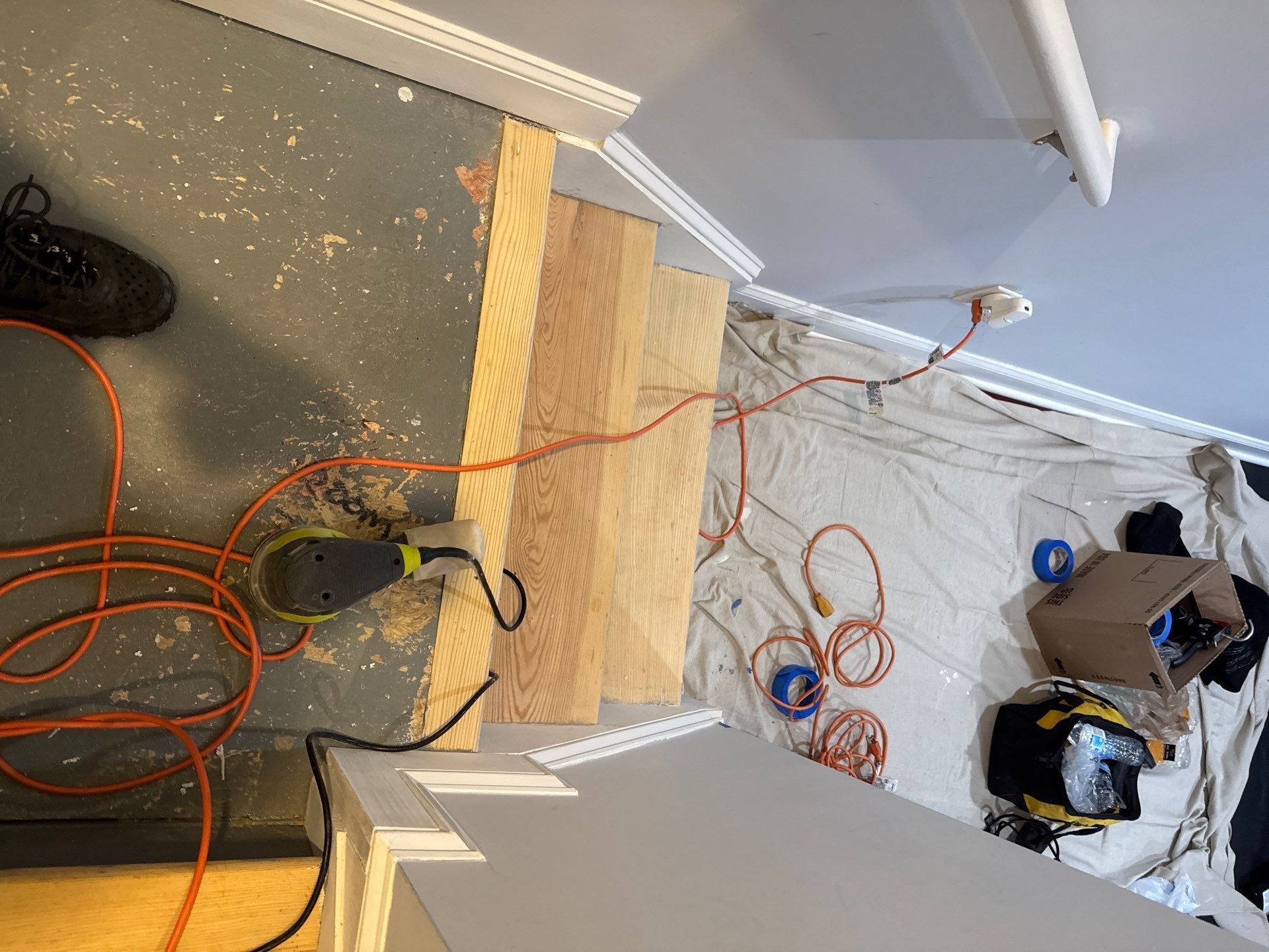 Stairway Installation using t vinyl stair tread and reversibleriser by La Bendicion Contruction Llc