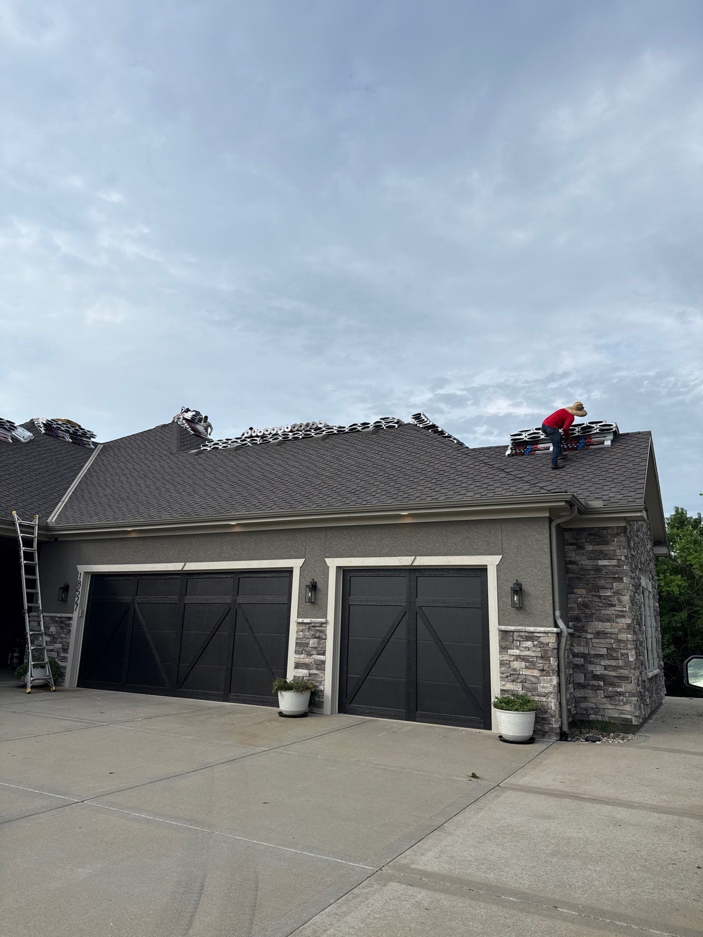 Rustic Black roof by Victor Construction