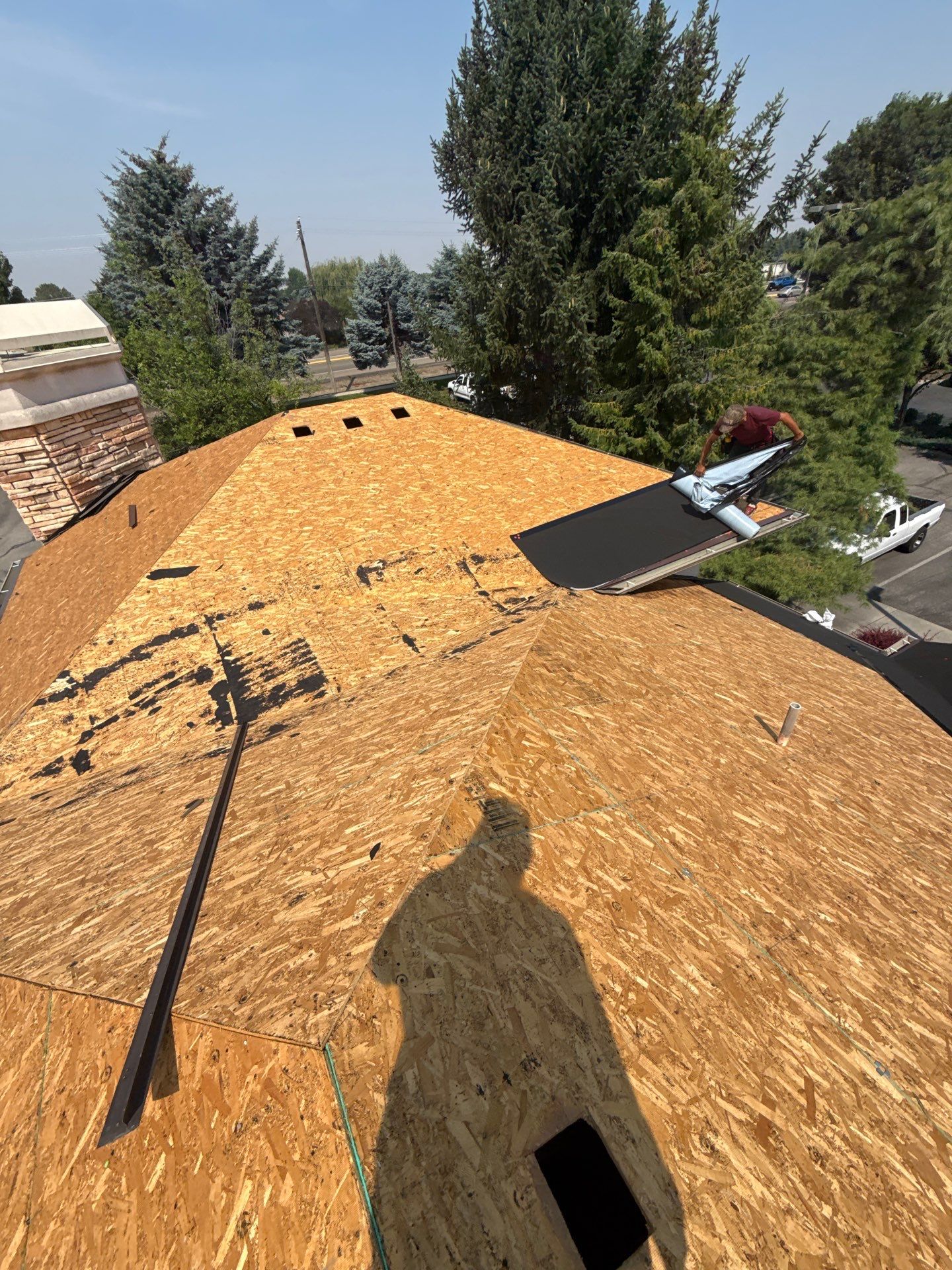 Boise Commercial Roof Replacement with Brown Architectural Shingles by Olive Roofing