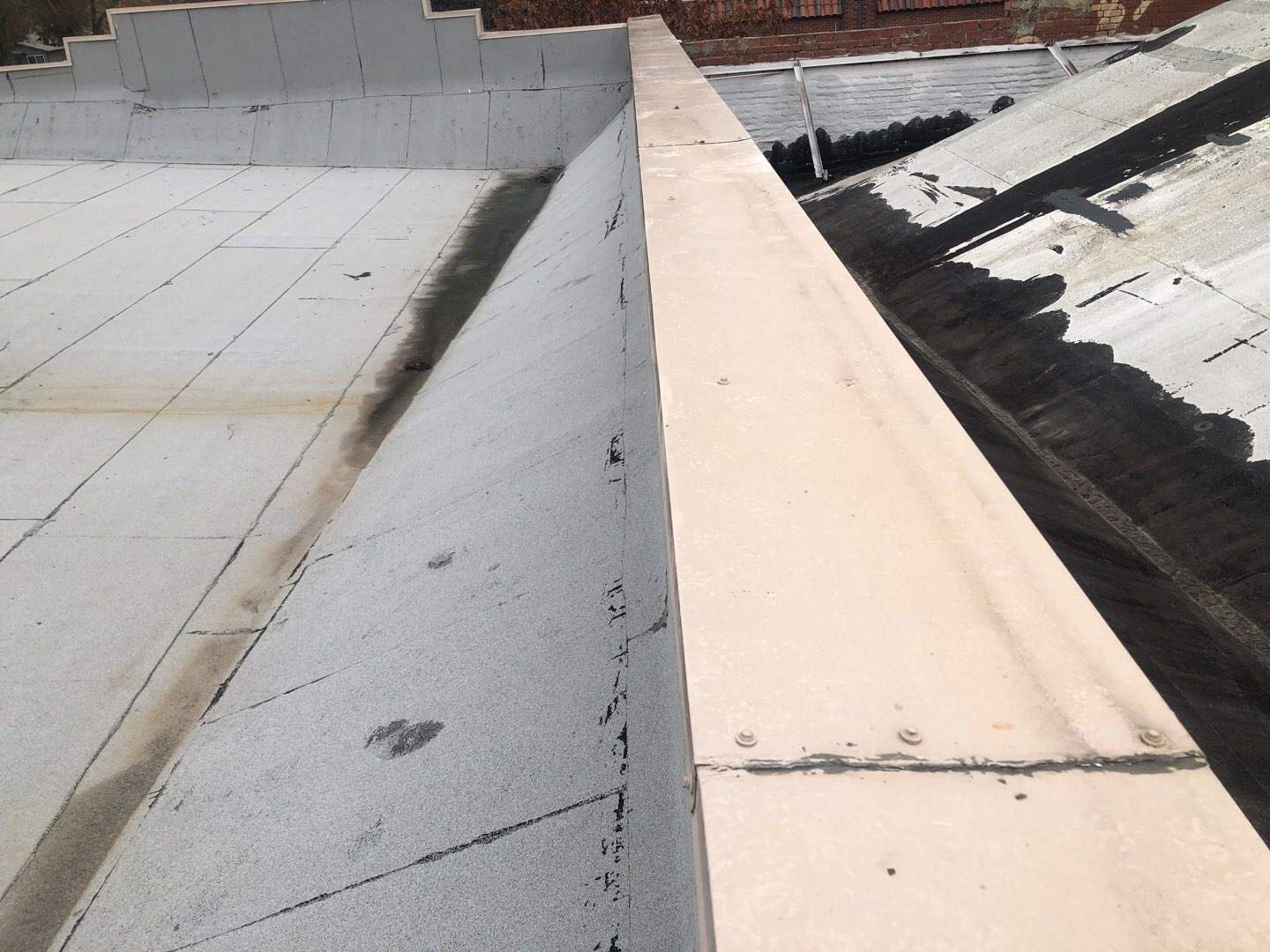 Spray foam and coatings using Conklin Benchmark/PUMA XL coatings and spray foam by Straight Edge Roofing Inc