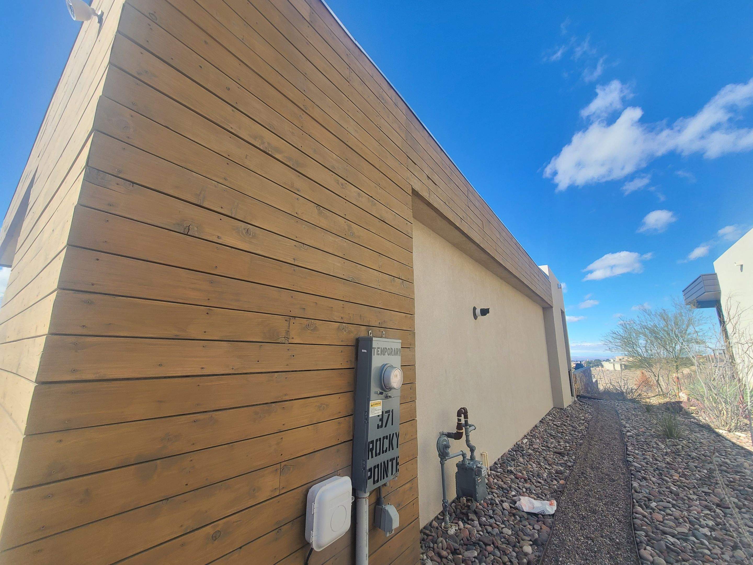 Exterior Wood Staining and Composite Decking Installation by Regal Renovate