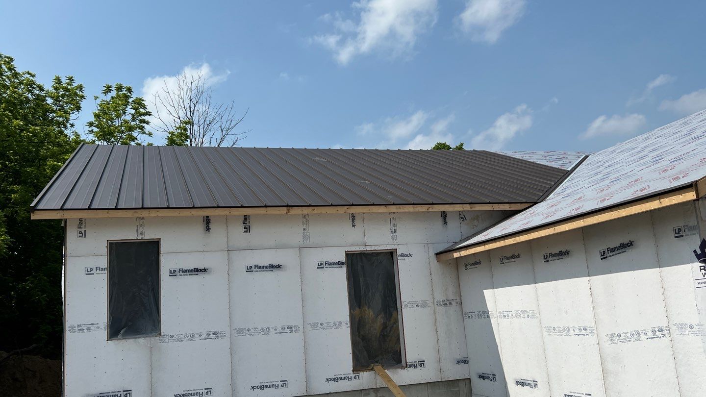 Commercial Roofing Installation using Standing Seam Metal - Burnished Slate Frost by RoofX 