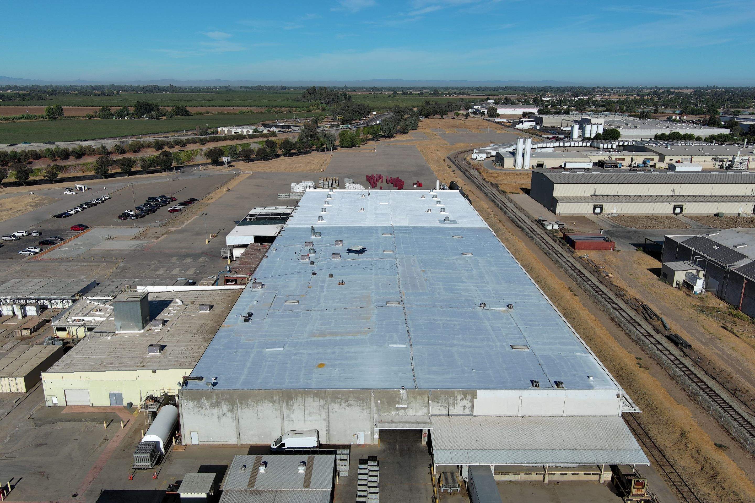 Pro Farms Spray foam roofing project by Straight Edge Roofing Inc