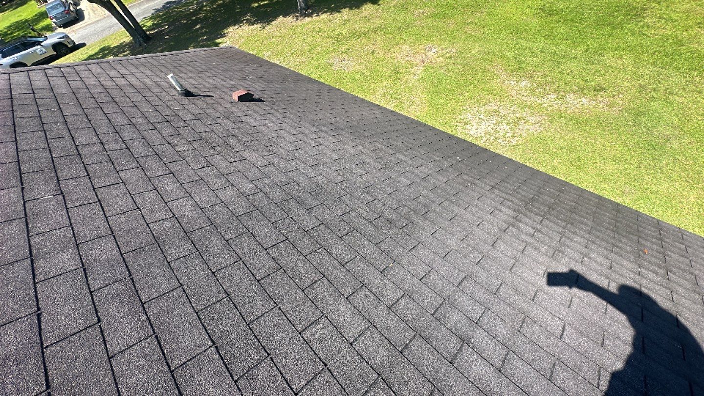 Residential Roofing Installation using Benton 26Ga 1inc Snapcock Metal Roof KYNAR Matte Black by Talya Roofing